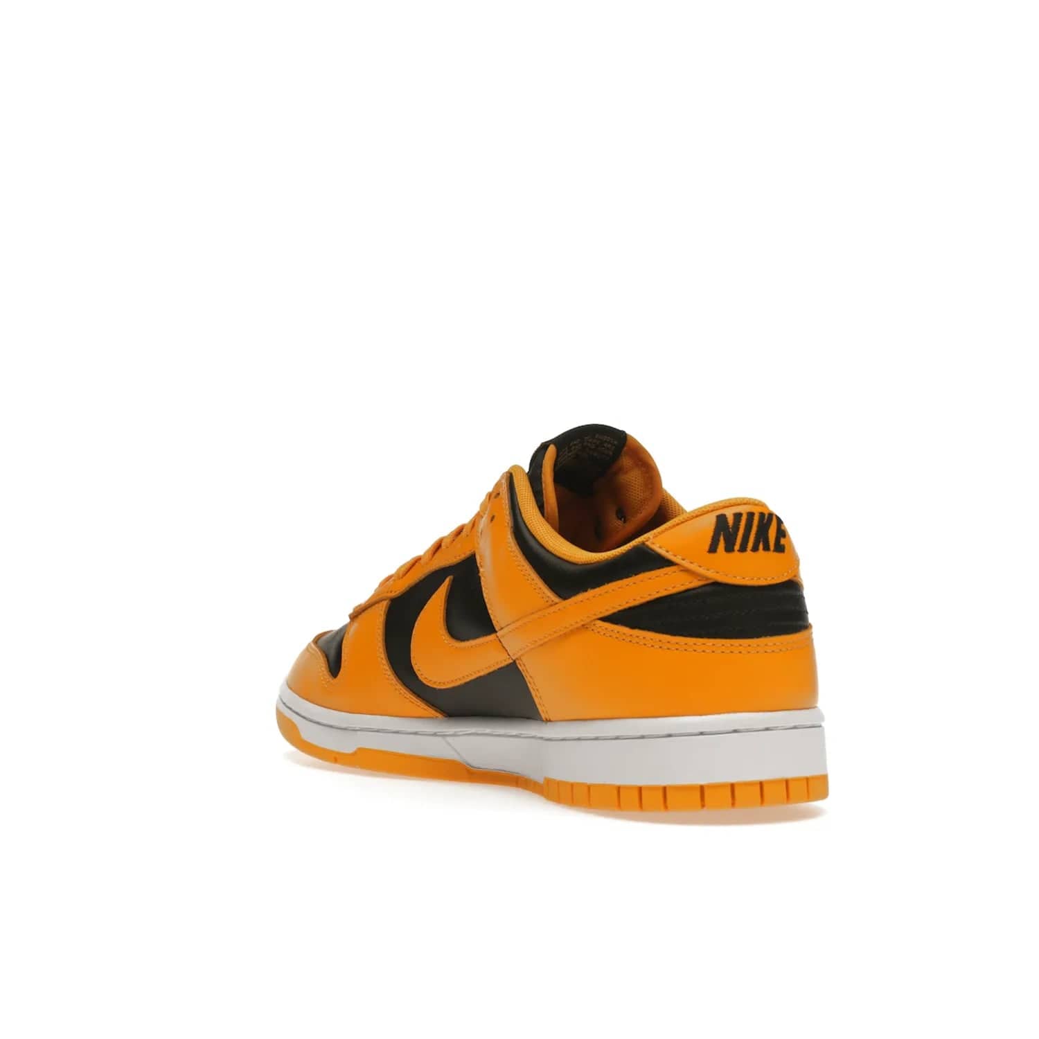 Nike Dunk Low Championship Goldenrod (2021) - Image 25 - Only at www.BallersClubKickz.com - Iconic silhouette Nike Dunk Low is back with a luxe look. Featuring a black upper, goldenrod overlays, and white and yellow Nike Air sole, this retro inspired design is perfect for the sneaker culture enthusiast. Releasing in December 2021 at $100.