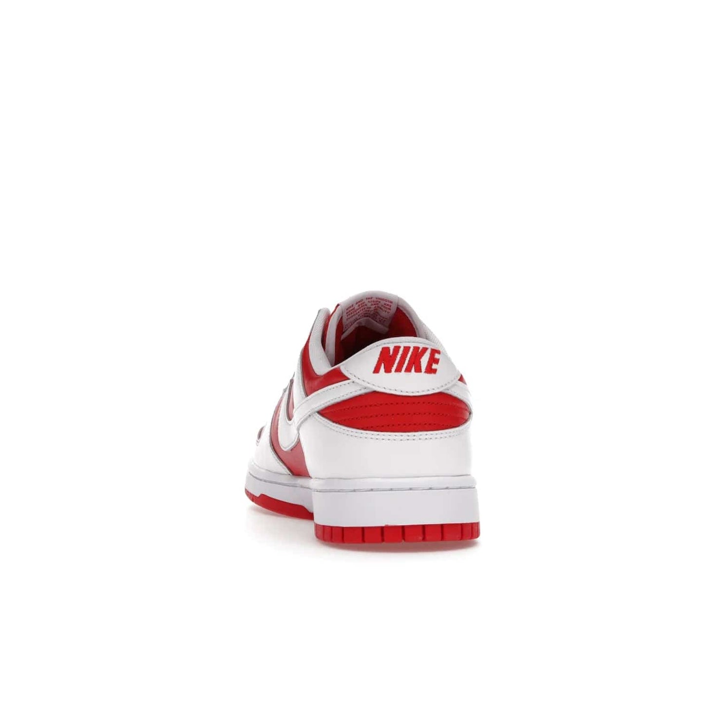 Nike Dunk Low Championship Red (2021) - Image 27 - Only at www.BallersClubKickz.com - A bold and stylish Nike Dunk Low Championship Red from 2021 with a classic retro design. University Red upper, white leather overlays and Swooshes, and a woven tongue label. Make a statement with these sleek kicks!