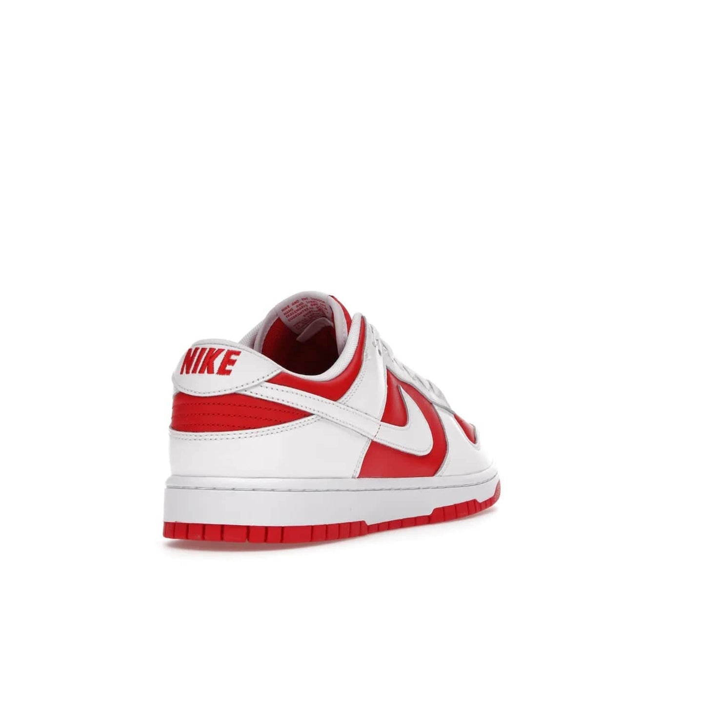Nike Dunk Low Championship Red (2021) - Image 31 - Only at www.BallersClubKickz.com - A bold and stylish Nike Dunk Low Championship Red from 2021 with a classic retro design. University Red upper, white leather overlays and Swooshes, and a woven tongue label. Make a statement with these sleek kicks!
