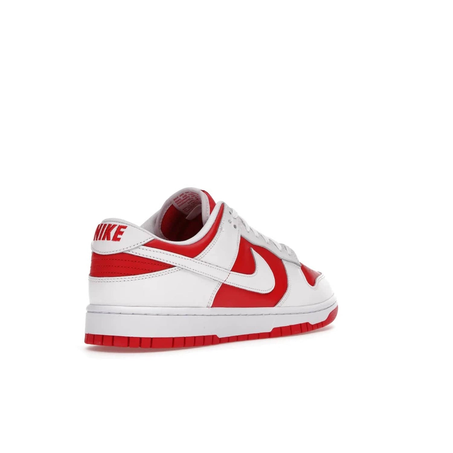 Nike Dunk Low Championship Red (2021) - Image 32 - Only at www.BallersClubKickz.com - A bold and stylish Nike Dunk Low Championship Red from 2021 with a classic retro design. University Red upper, white leather overlays and Swooshes, and a woven tongue label. Make a statement with these sleek kicks!