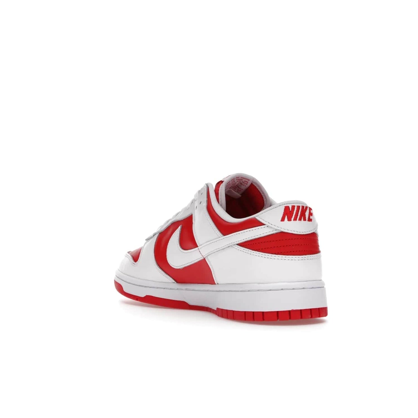 Nike Dunk Low Championship Red (2021) - Image 25 - Only at www.BallersClubKickz.com - A bold and stylish Nike Dunk Low Championship Red from 2021 with a classic retro design. University Red upper, white leather overlays and Swooshes, and a woven tongue label. Make a statement with these sleek kicks!