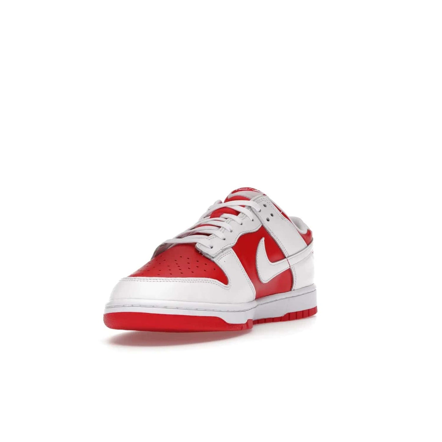 Nike Dunk Low Championship Red (2021) - Image 13 - Only at www.BallersClubKickz.com - A bold and stylish Nike Dunk Low Championship Red from 2021 with a classic retro design. University Red upper, white leather overlays and Swooshes, and a woven tongue label. Make a statement with these sleek kicks!