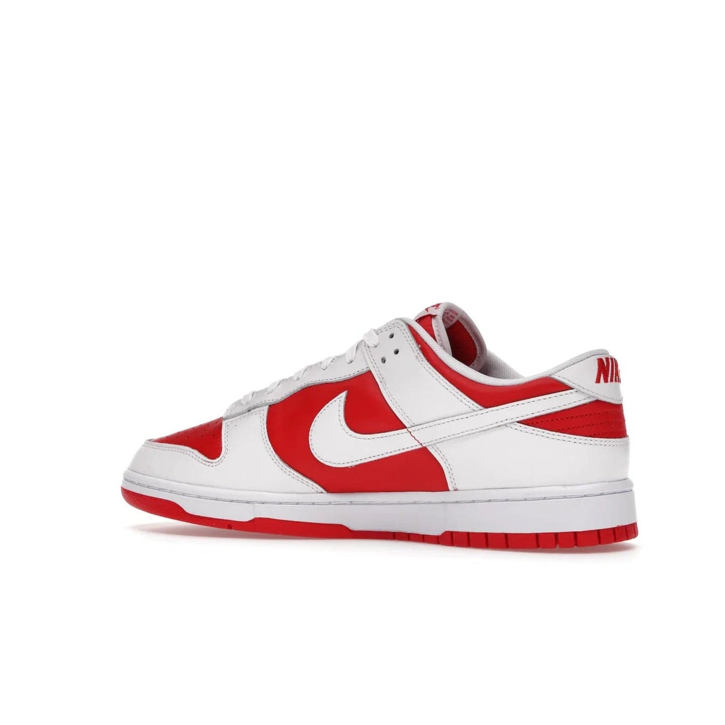 Nike Dunk Low Championship Red (2021) - Image 22 - Only at www.BallersClubKickz.com - A bold and stylish Nike Dunk Low Championship Red from 2021 with a classic retro design. University Red upper, white leather overlays and Swooshes, and a woven tongue label. Make a statement with these sleek kicks!