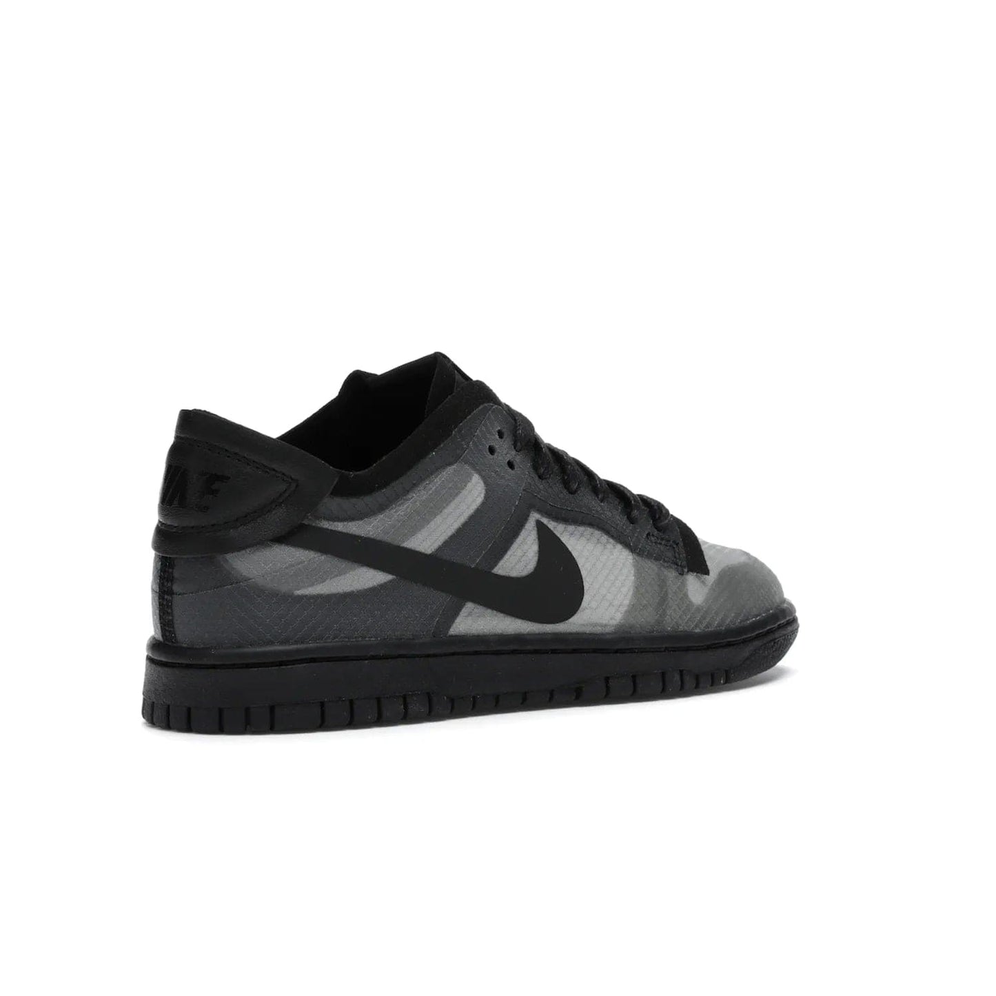 Nike Dunk Low Comme des Garcons Black (Women's) - Image 33 - Only at www.BallersClubKickz.com - Boost your style with the Nike Dunk Low Comme des Garcons Black (Women's). Monochromatic, yet luxurious design perfect for any season. Limited edition women’s shoe with black nexkin and stretch-woven fabric, waxed laces, rubber sole, and Swoosh logo. Elevate your sneaker game with this must-have from May 2020.