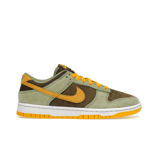 Nike Dunk Low Dusty Olive (2021/2023) - Image 1 - Only at www.BallersClubKickz.com - Nike Dunk Low Dusty Olive brings premium materials and timeless sneaker design to the streets. Pro Gold suede, brown canvas, and Dusty Olive suede upper complete the classic look with a white midsole and Pro Gold outsole. Get the perfect balance of style and comfort with the Nike Dunk Low Dusty Olive.