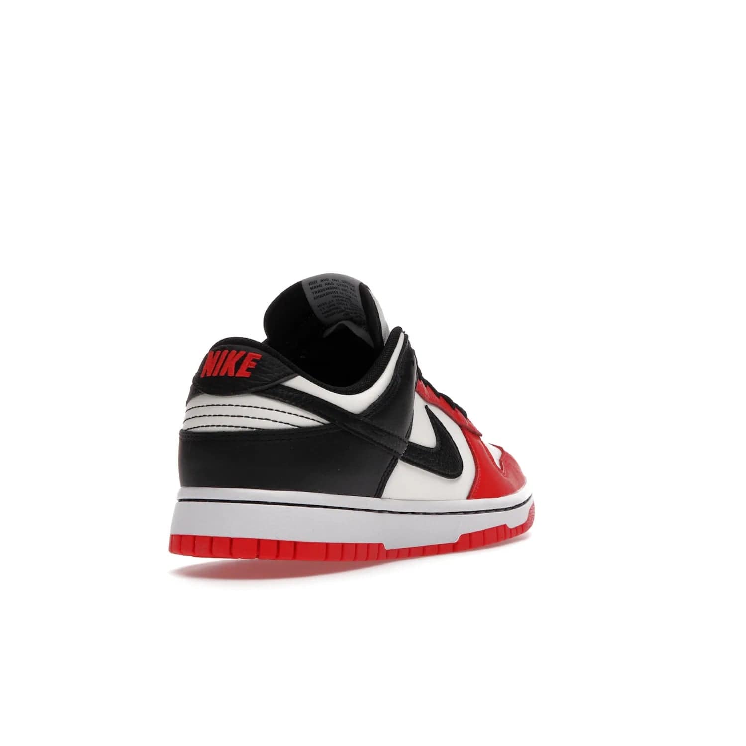 Nike Dunk Low EMB NBA 75th Anniversary Chicago - Image 31 - Only at www.BallersClubKickz.com - The Nike Dunk Low EMB celebrates the NBA's 75th Anniversary with a sleek Sail Leather upper, black overlays and vibrant red accent tones. Finished off with an NBA logo woven tongue tag and a black sole for a monochrome look.