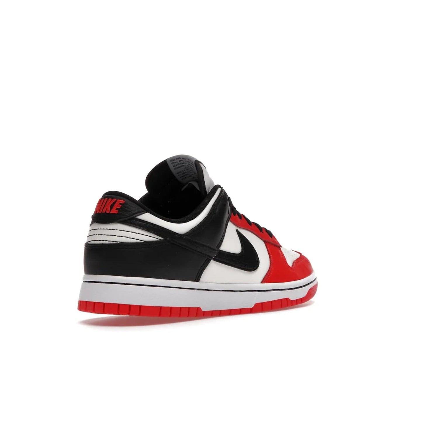Nike Dunk Low EMB NBA 75th Anniversary Chicago - Image 32 - Only at www.BallersClubKickz.com - The Nike Dunk Low EMB celebrates the NBA's 75th Anniversary with a sleek Sail Leather upper, black overlays and vibrant red accent tones. Finished off with an NBA logo woven tongue tag and a black sole for a monochrome look.