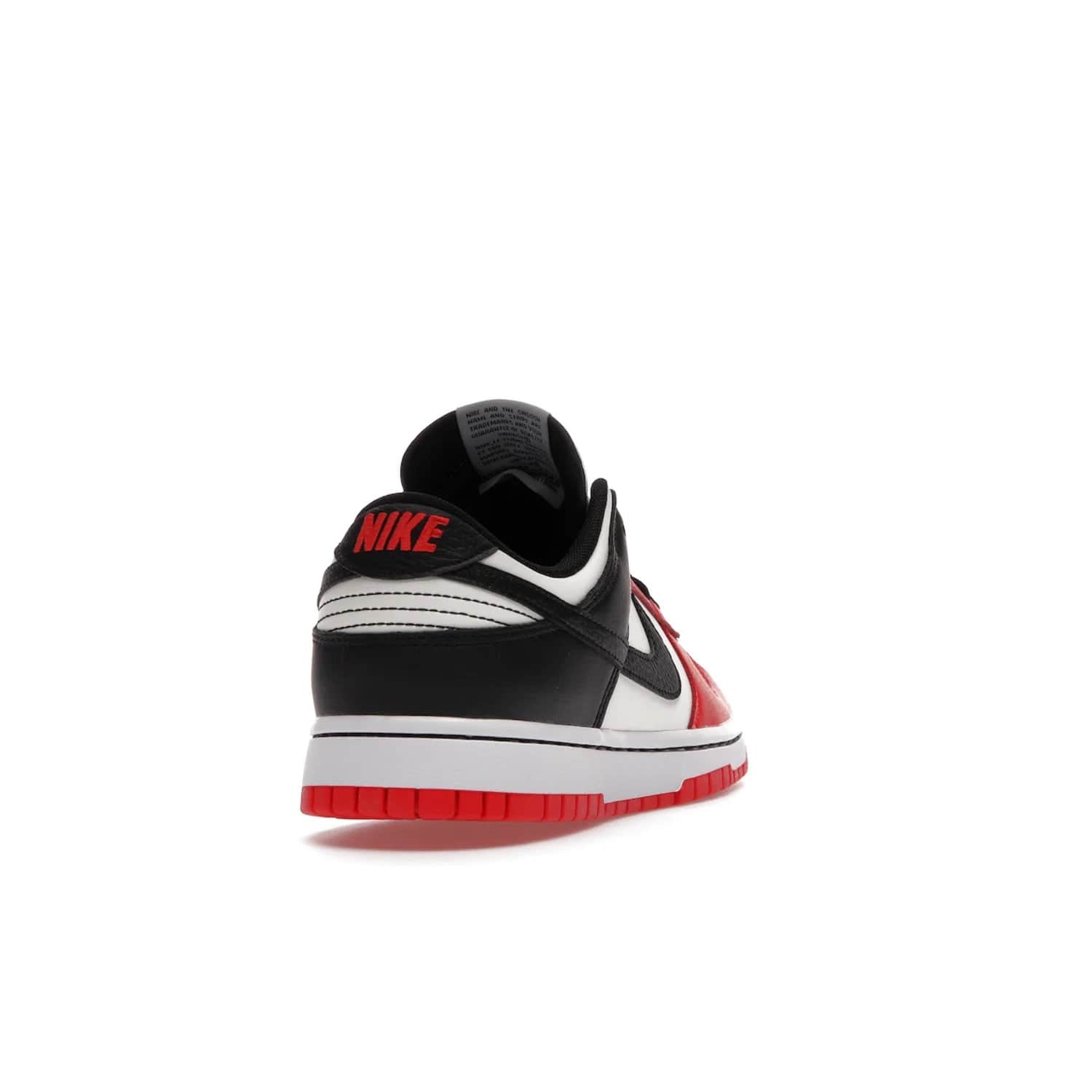 Nike Dunk Low EMB NBA 75th Anniversary Chicago - Image 30 - Only at www.BallersClubKickz.com - The Nike Dunk Low EMB celebrates the NBA's 75th Anniversary with a sleek Sail Leather upper, black overlays and vibrant red accent tones. Finished off with an NBA logo woven tongue tag and a black sole for a monochrome look.