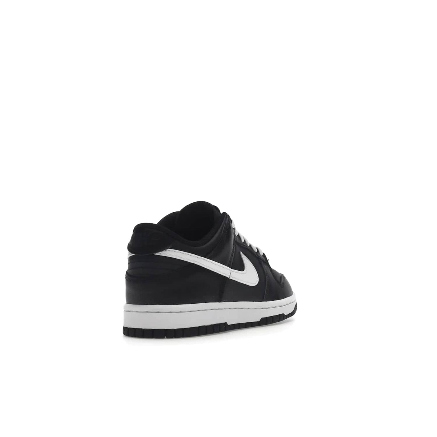 Nike Dunk Low Black White (2022) (GS) - Image 31 - Only at www.BallersClubKickz.com - A classic two-tone upper of black & off white, low profile midsole, and patterned rubber outsole make the Nike Dunk Low Black White 2022 GS perfect for any style. Get the complete look and release date on July 12, 2022.