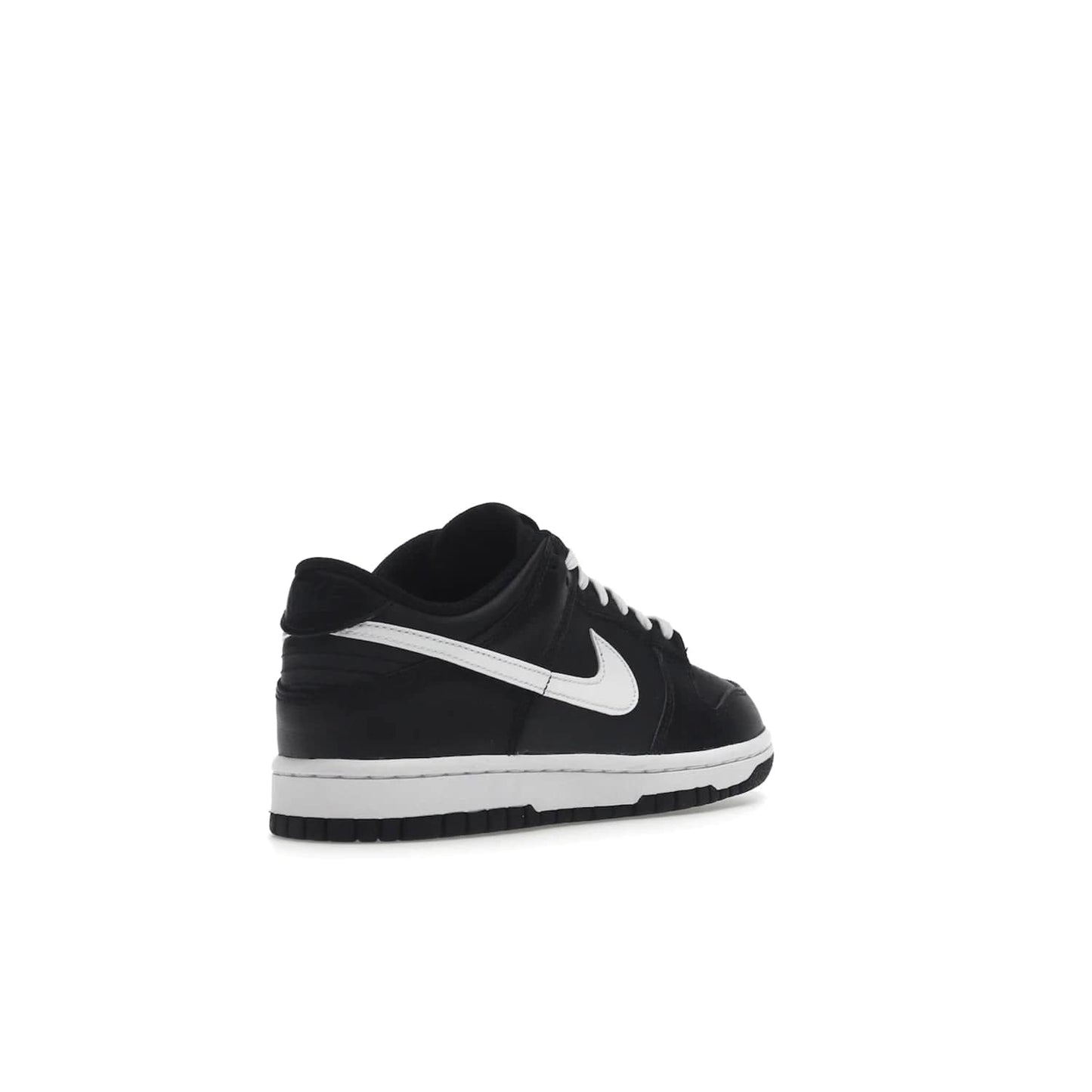 Nike Dunk Low Black White (2022) (GS) - Image 32 - Only at www.BallersClubKickz.com - A classic two-tone upper of black & off white, low profile midsole, and patterned rubber outsole make the Nike Dunk Low Black White 2022 GS perfect for any style. Get the complete look and release date on July 12, 2022.