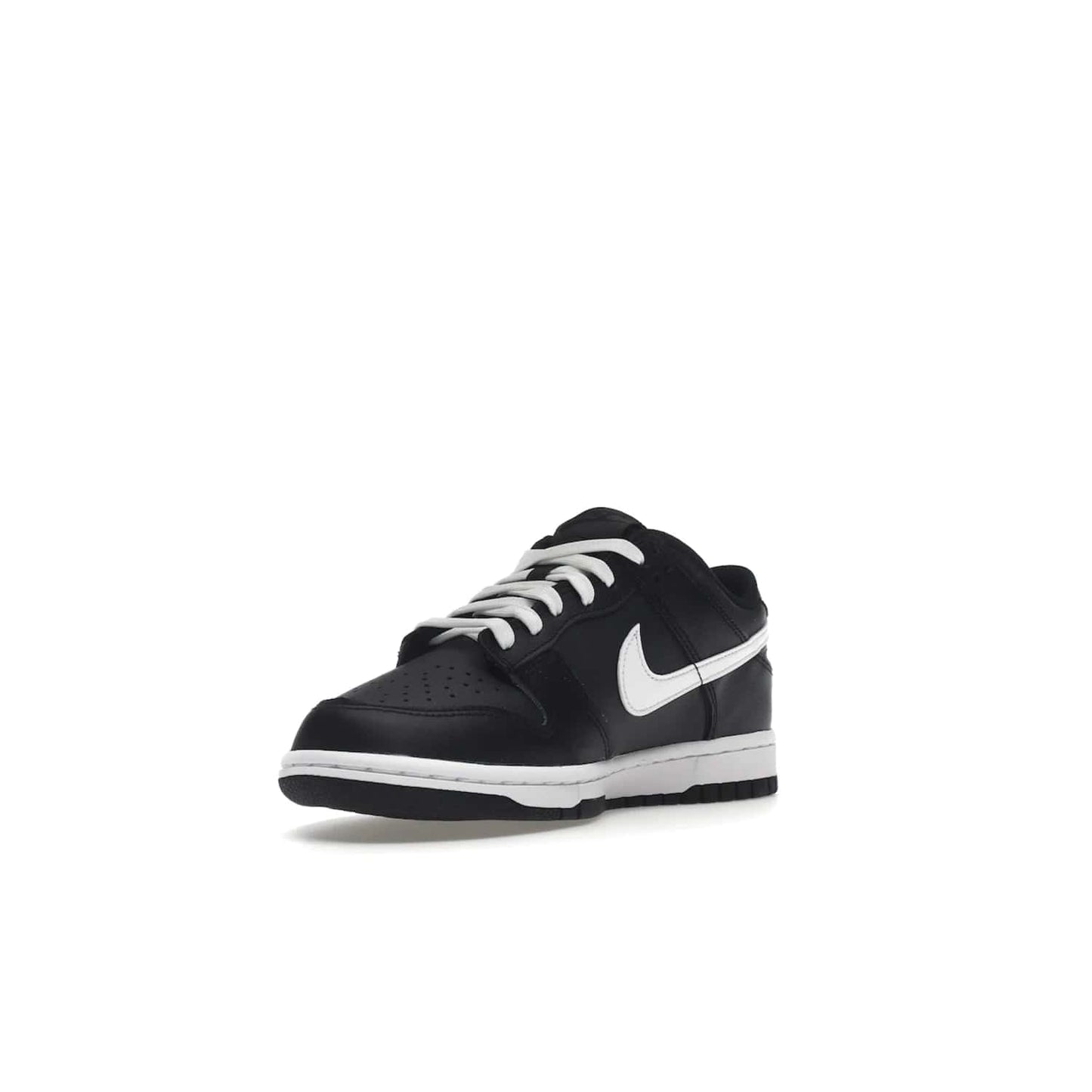 Nike Dunk Low Black White (2022) (GS) - Image 14 - Only at www.BallersClubKickz.com - A classic two-tone upper of black & off white, low profile midsole, and patterned rubber outsole make the Nike Dunk Low Black White 2022 GS perfect for any style. Get the complete look and release date on July 12, 2022.