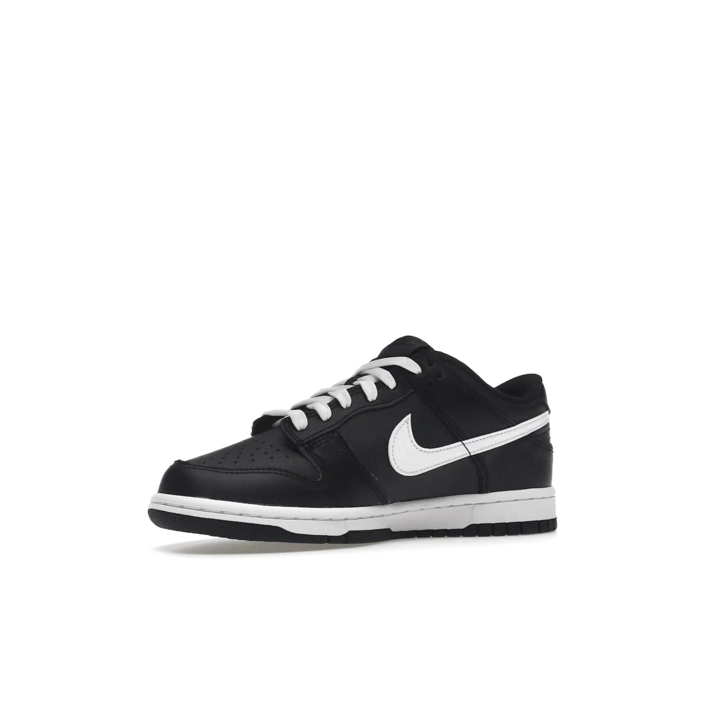 Nike Dunk Low Black White (2022) (GS) - Image 16 - Only at www.BallersClubKickz.com - A classic two-tone upper of black & off white, low profile midsole, and patterned rubber outsole make the Nike Dunk Low Black White 2022 GS perfect for any style. Get the complete look and release date on July 12, 2022.