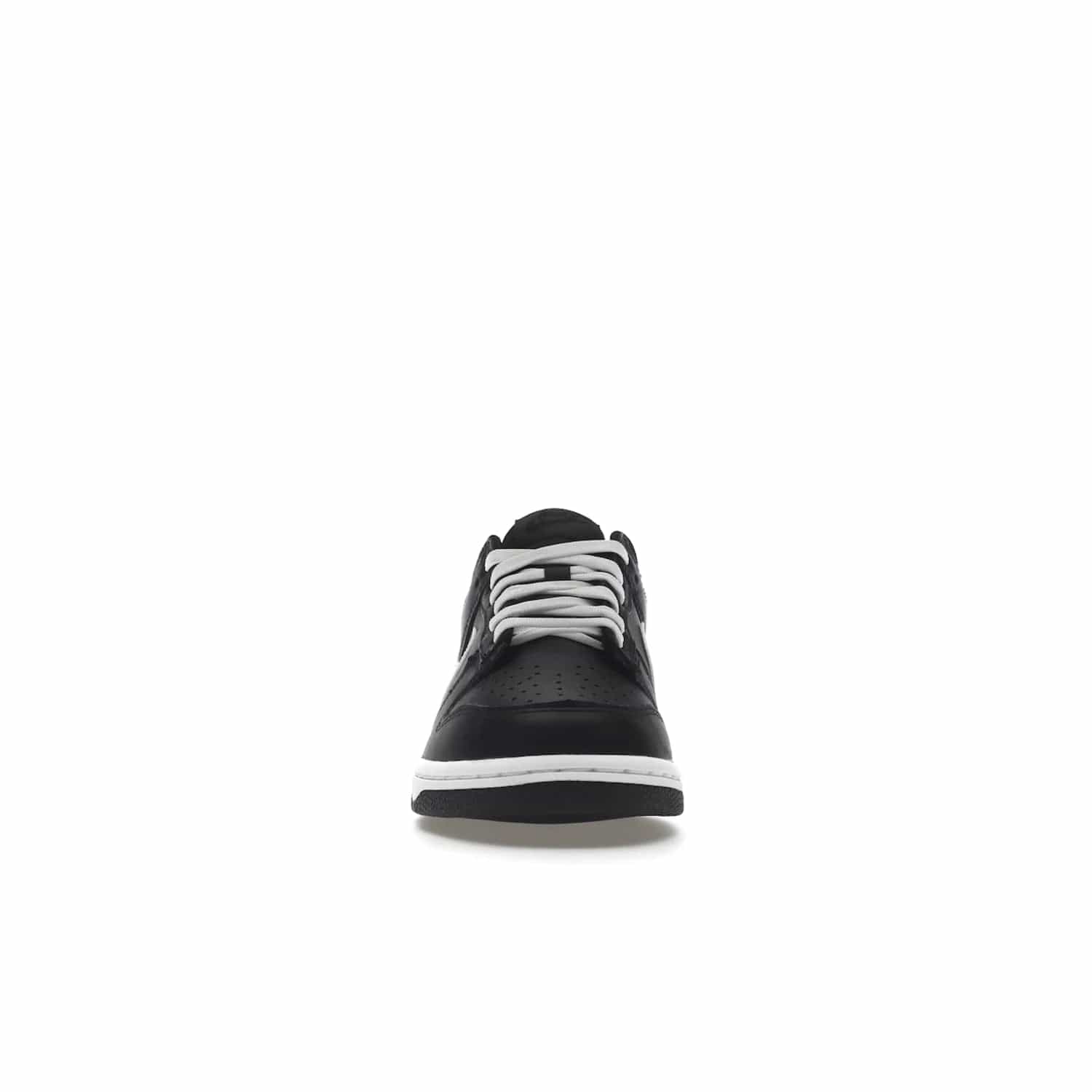 Nike Dunk Low Black White (2022) (GS) - Image 10 - Only at www.BallersClubKickz.com - A classic two-tone upper of black & off white, low profile midsole, and patterned rubber outsole make the Nike Dunk Low Black White 2022 GS perfect for any style. Get the complete look and release date on July 12, 2022.