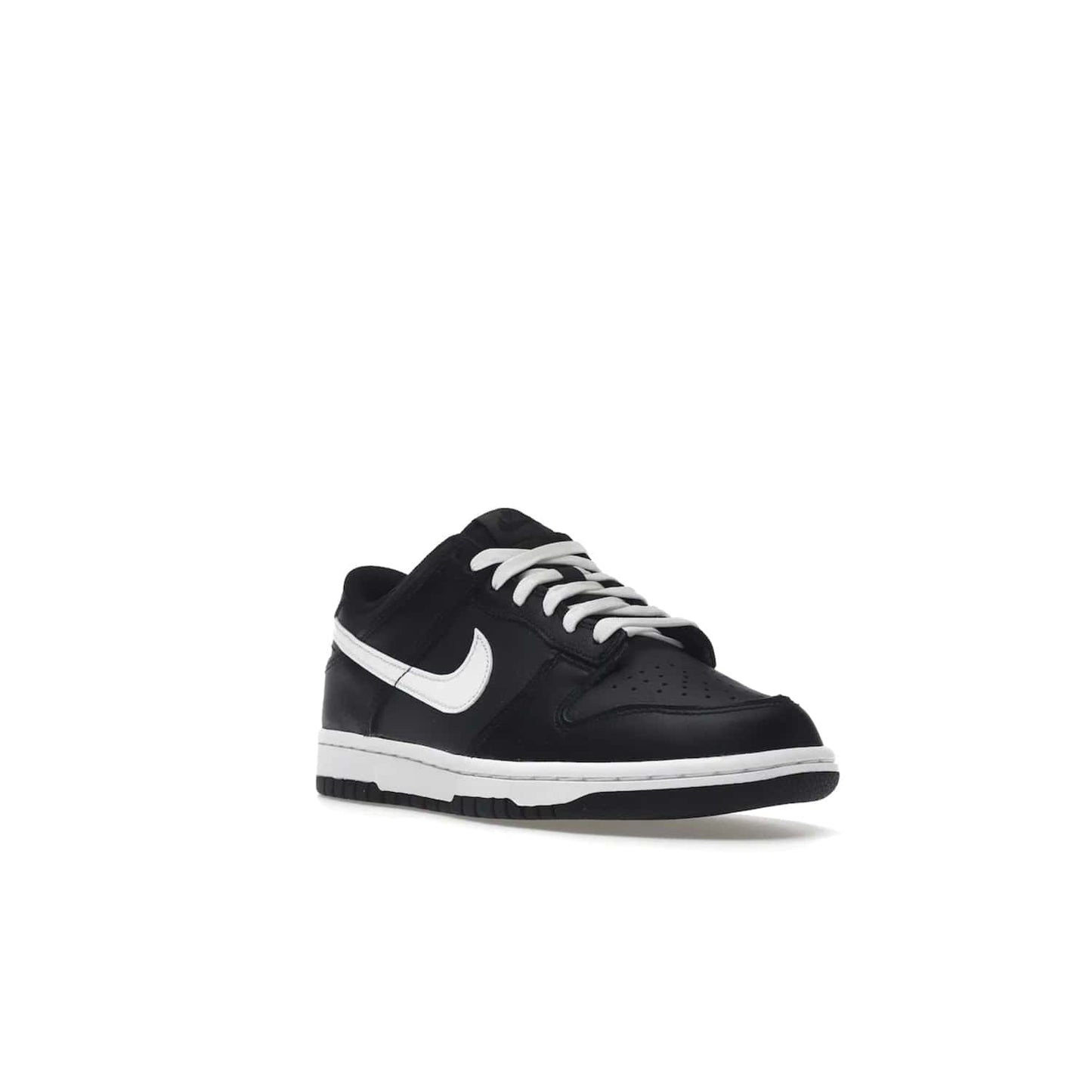 Nike Dunk Low Black White (2022) (GS) - Image 6 - Only at www.BallersClubKickz.com - A classic two-tone upper of black & off white, low profile midsole, and patterned rubber outsole make the Nike Dunk Low Black White 2022 GS perfect for any style. Get the complete look and release date on July 12, 2022.