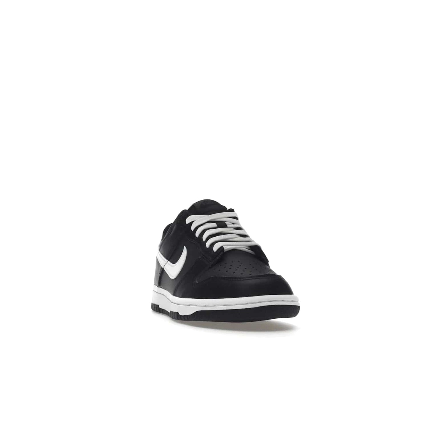 Nike Dunk Low Black White (2022) (GS) - Image 8 - Only at www.BallersClubKickz.com - A classic two-tone upper of black & off white, low profile midsole, and patterned rubber outsole make the Nike Dunk Low Black White 2022 GS perfect for any style. Get the complete look and release date on July 12, 2022.