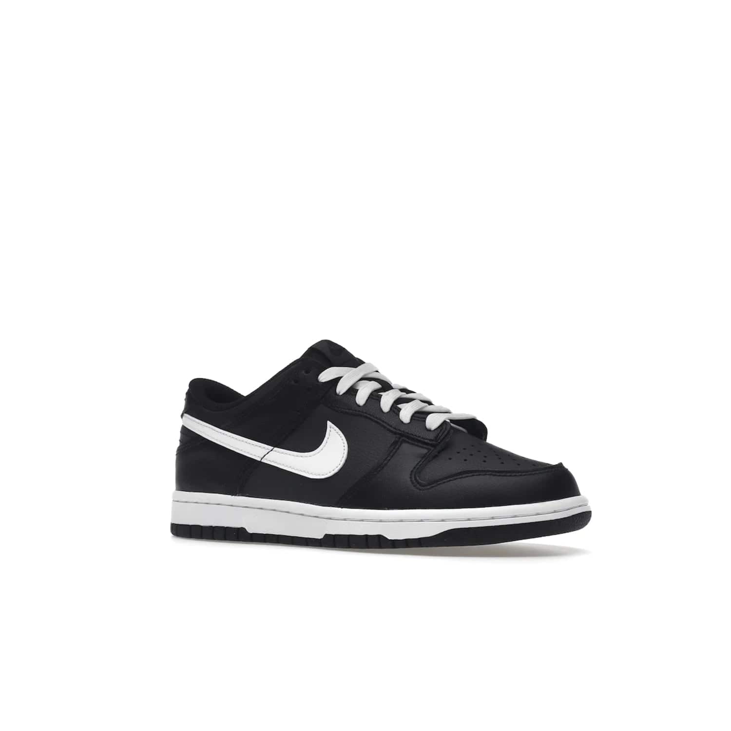 Nike Dunk Low Black White (2022) (GS) - Image 4 - Only at www.BallersClubKickz.com - A classic two-tone upper of black & off white, low profile midsole, and patterned rubber outsole make the Nike Dunk Low Black White 2022 GS perfect for any style. Get the complete look and release date on July 12, 2022.