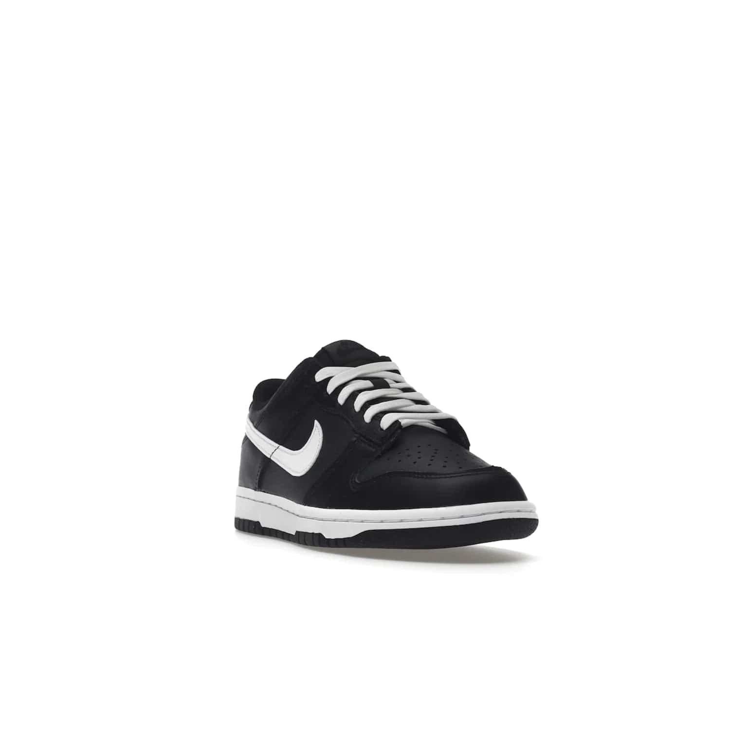 Nike Dunk Low Black White (2022) (GS) - Image 7 - Only at www.BallersClubKickz.com - A classic two-tone upper of black & off white, low profile midsole, and patterned rubber outsole make the Nike Dunk Low Black White 2022 GS perfect for any style. Get the complete look and release date on July 12, 2022.