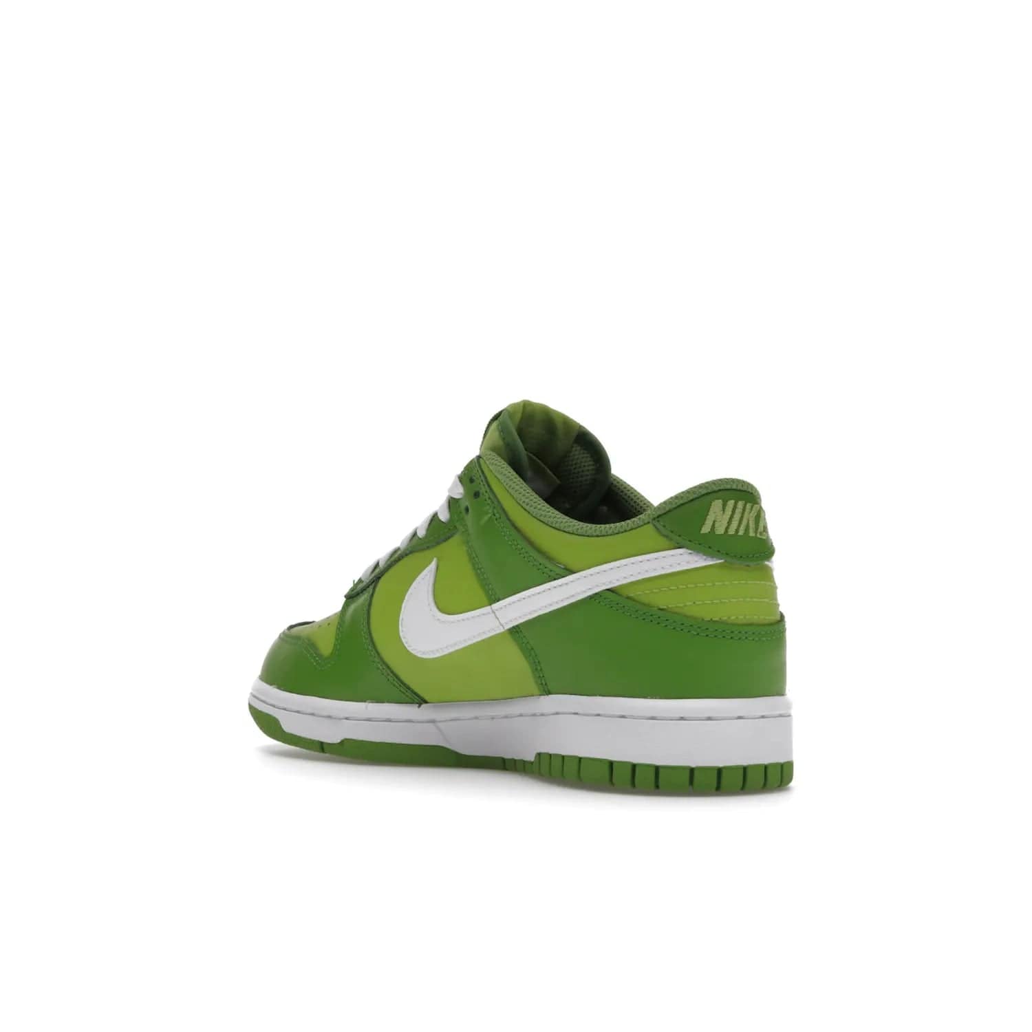Nike Dunk Low Chlorophyll (GS) - Image 24 - Only at www.BallersClubKickz.com - Grade schoolers release the Nike Dunk Low Chlorophyll (GS) featuring a vivid green leather base with chlorophyll green overlays, plus Nike branding in chlorophyll green. White midsole and outsole complete the design. Released Jan 2022.