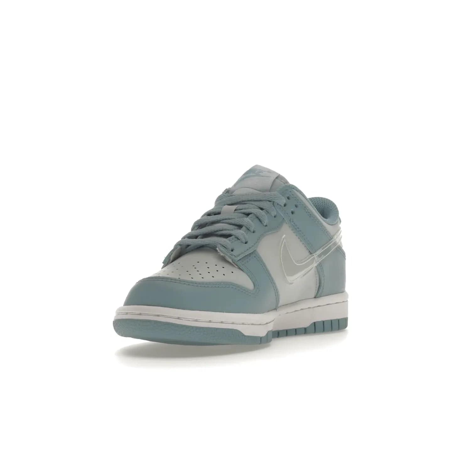 Nike Dunk Low Clear Blue Swoosh (GS) - Image 13 - Only at www.BallersClubKickz.com - Glimmer with style in Nike Dunk Low Clear Blue (GS). Tumbled leather and Worn Blue overlays combine for a stunning finish, topped with a Clear TPU Swoosh. White and Worn Blue Air sole complete this cool and affordable design for kids.