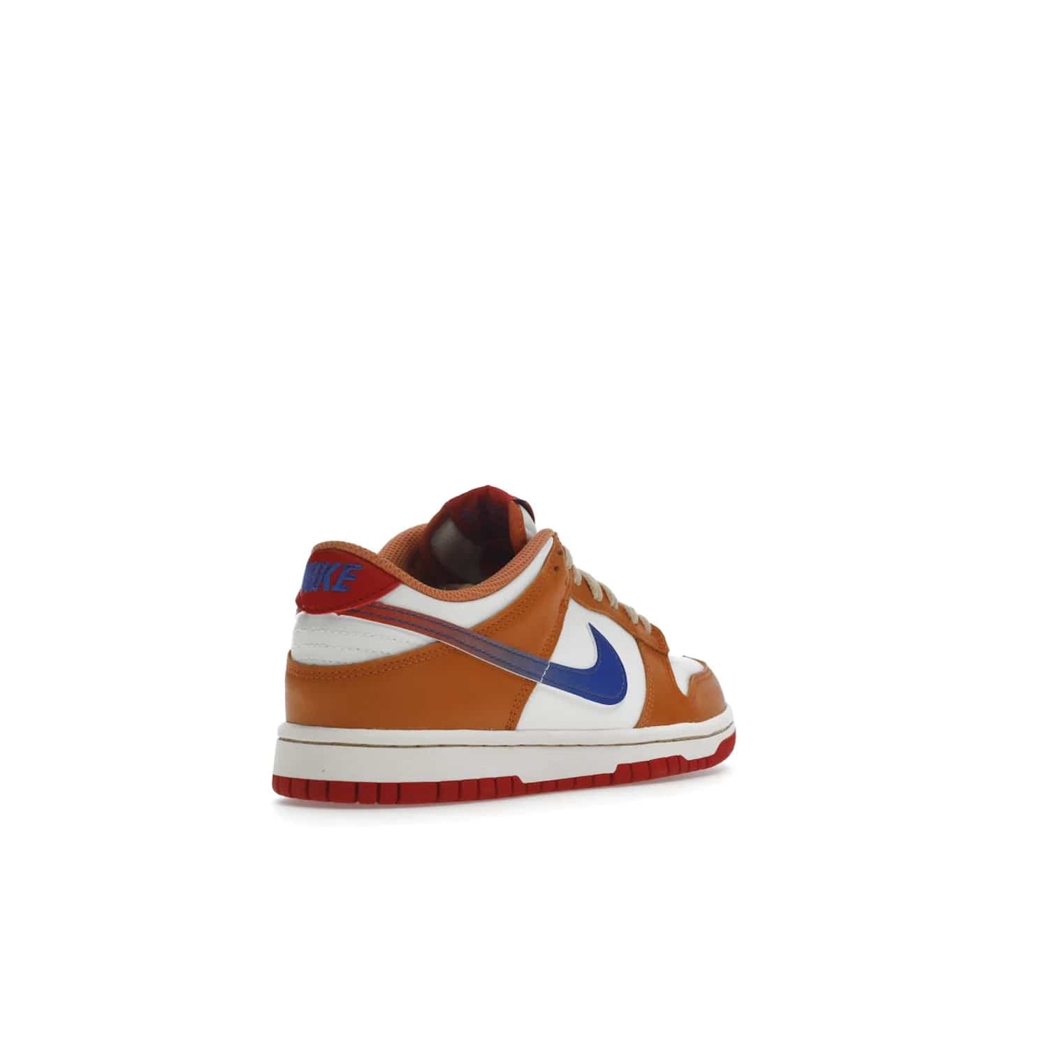Nike Dunk Low Hot Curry Game Royal (GS) - Image 32 - Only at www.BallersClubKickz.com - Shop the Nike Dunk Low Hot Curry Game Royal GS and rock a classic color scheme to represent the New York Knicks. Featuring a smooth leather upper, retro Nike branding and a low cut collar and rubber cup sole for comfort and protection. Get yours on September 7 at $85.