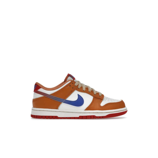 Nike Dunk Low Hot Curry Game Royal (GS) - Image 1 - Only at www.BallersClubKickz.com - Shop the Nike Dunk Low Hot Curry Game Royal GS and rock a classic color scheme to represent the New York Knicks. Featuring a smooth leather upper, retro Nike branding and a low cut collar and rubber cup sole for comfort and protection. Get yours on September 7 at $85.