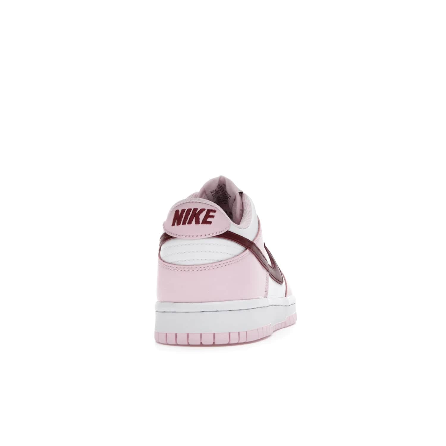 Nike Dunk Low Pink Foam Red White (GS) - Image 29 - Only at www.BallersClubKickz.com - #
Introducing the daring and stylish Nike Dunk Low Pink Foam Red White (GS) sneaker for grade schoolers. White leather with pink overlays and Dark Beetroot accents, classic Nike Dunk midsole and pink outsole. Released August 2021 for $85.