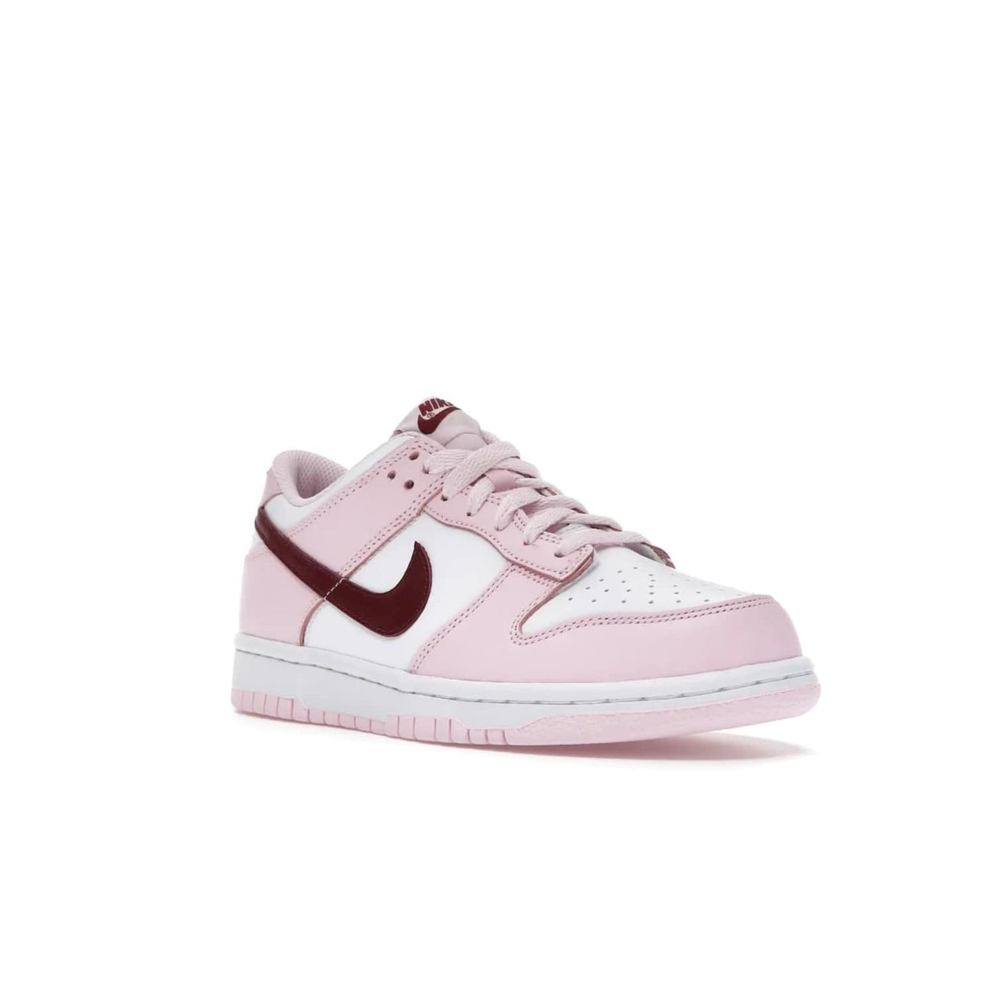 Nike Dunk Low Pink Foam Red White (GS) - Image 6 - Only at www.BallersClubKickz.com - #
Introducing the daring and stylish Nike Dunk Low Pink Foam Red White (GS) sneaker for grade schoolers. White leather with pink overlays and Dark Beetroot accents, classic Nike Dunk midsole and pink outsole. Released August 2021 for $85.