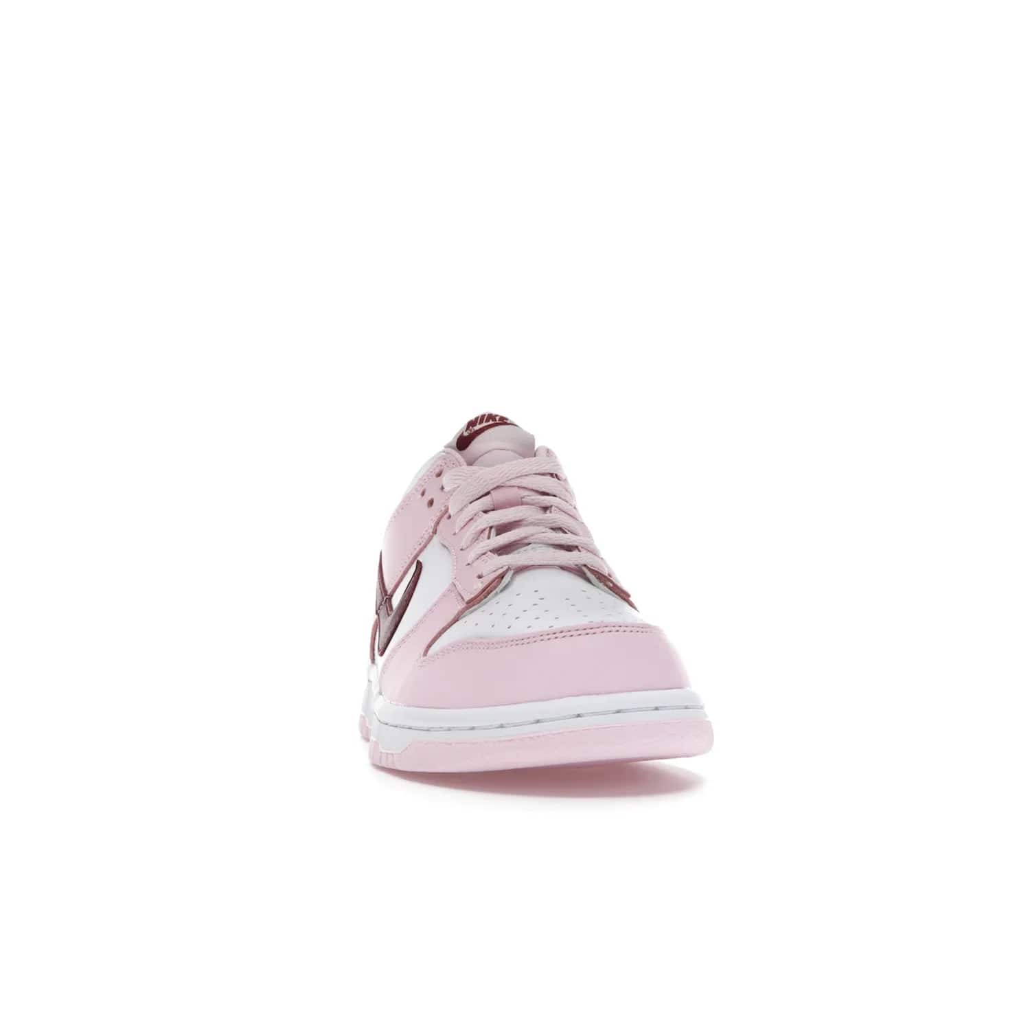 Nike Dunk Low Pink Foam Red White (GS) - Image 9 - Only at www.BallersClubKickz.com - #
Introducing the daring and stylish Nike Dunk Low Pink Foam Red White (GS) sneaker for grade schoolers. White leather with pink overlays and Dark Beetroot accents, classic Nike Dunk midsole and pink outsole. Released August 2021 for $85.
