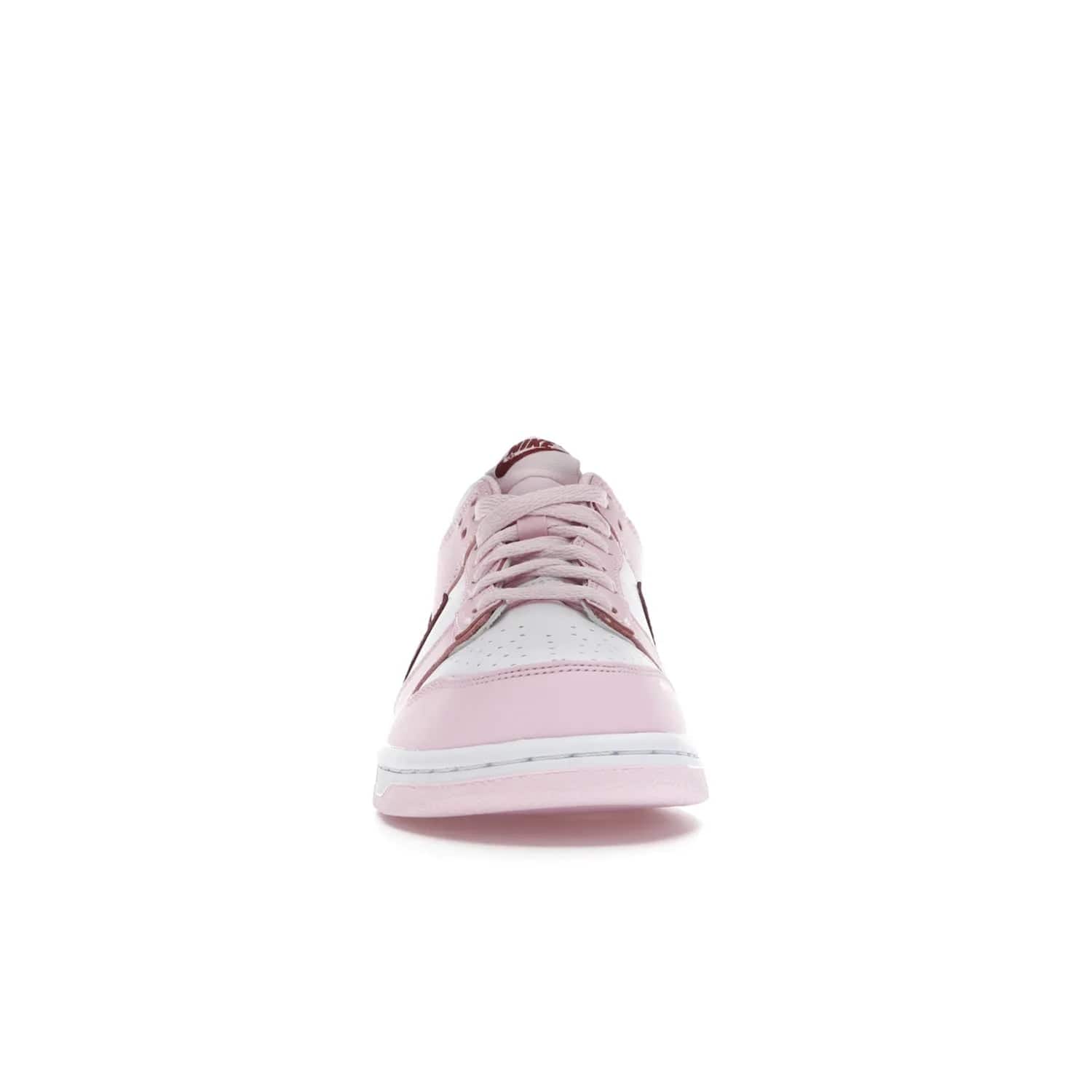 Nike Dunk Low Pink Foam Red White (GS) - Image 10 - Only at www.BallersClubKickz.com - #
Introducing the daring and stylish Nike Dunk Low Pink Foam Red White (GS) sneaker for grade schoolers. White leather with pink overlays and Dark Beetroot accents, classic Nike Dunk midsole and pink outsole. Released August 2021 for $85.