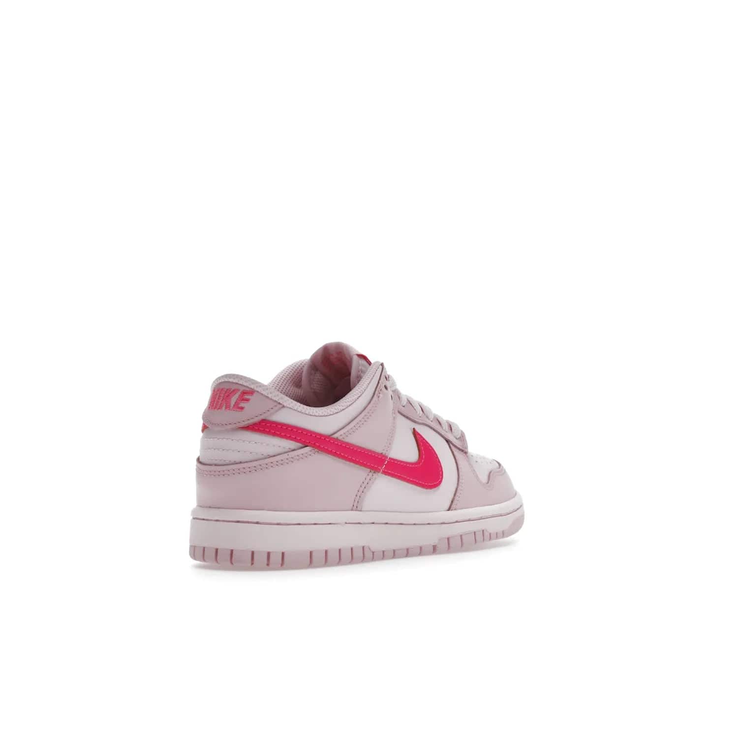 Nike Dunk Low Triple Pink (GS) - Image 32 - Only at www.BallersClubKickz.com - The Nike Dunk Low Triple Pink provides bold style in GS sizing. Featuring 3 distinct shades of pink and Nike branding, the shoe stands out.