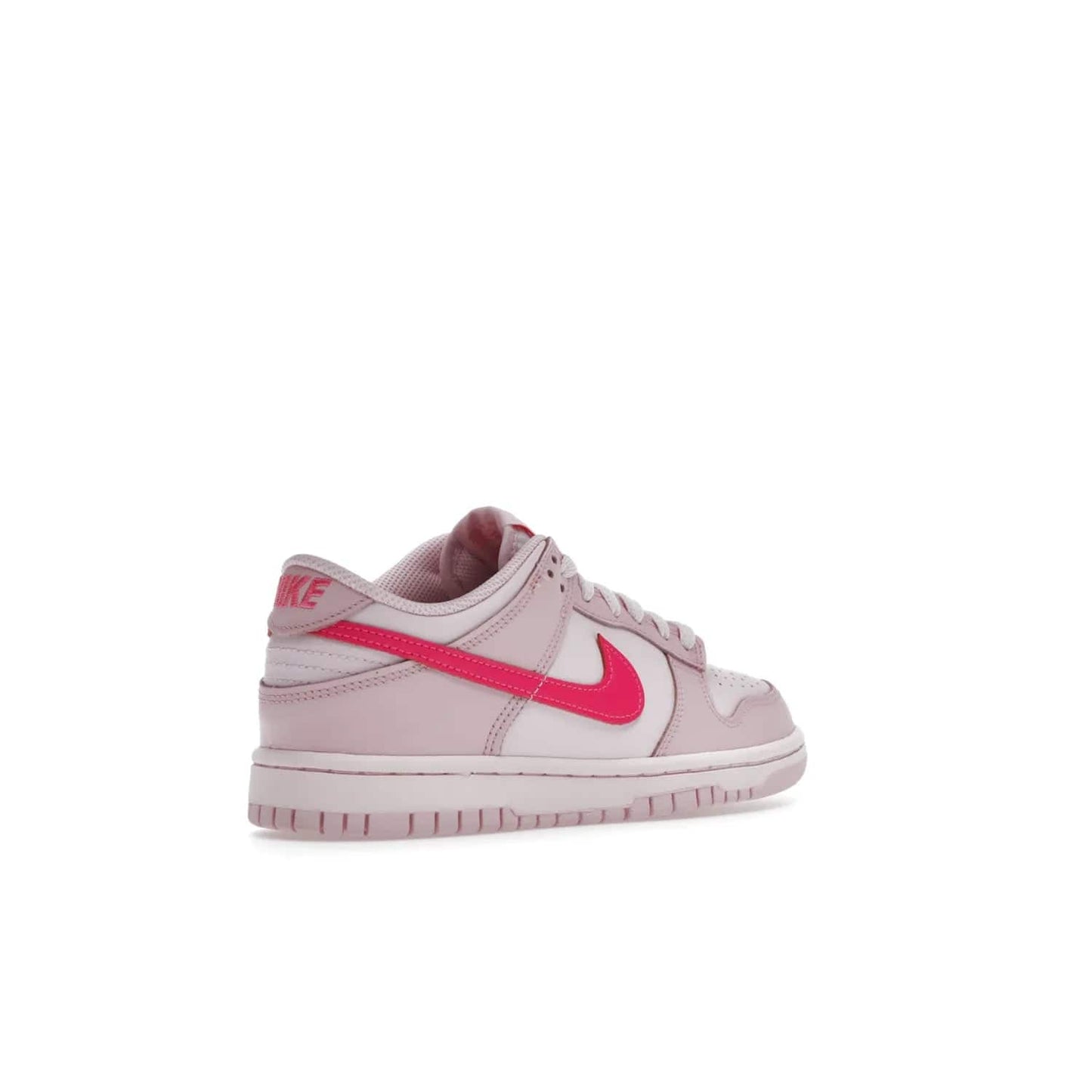 Nike Dunk Low Triple Pink (GS) - Image 33 - Only at www.BallersClubKickz.com - The Nike Dunk Low Triple Pink provides bold style in GS sizing. Featuring 3 distinct shades of pink and Nike branding, the shoe stands out.
