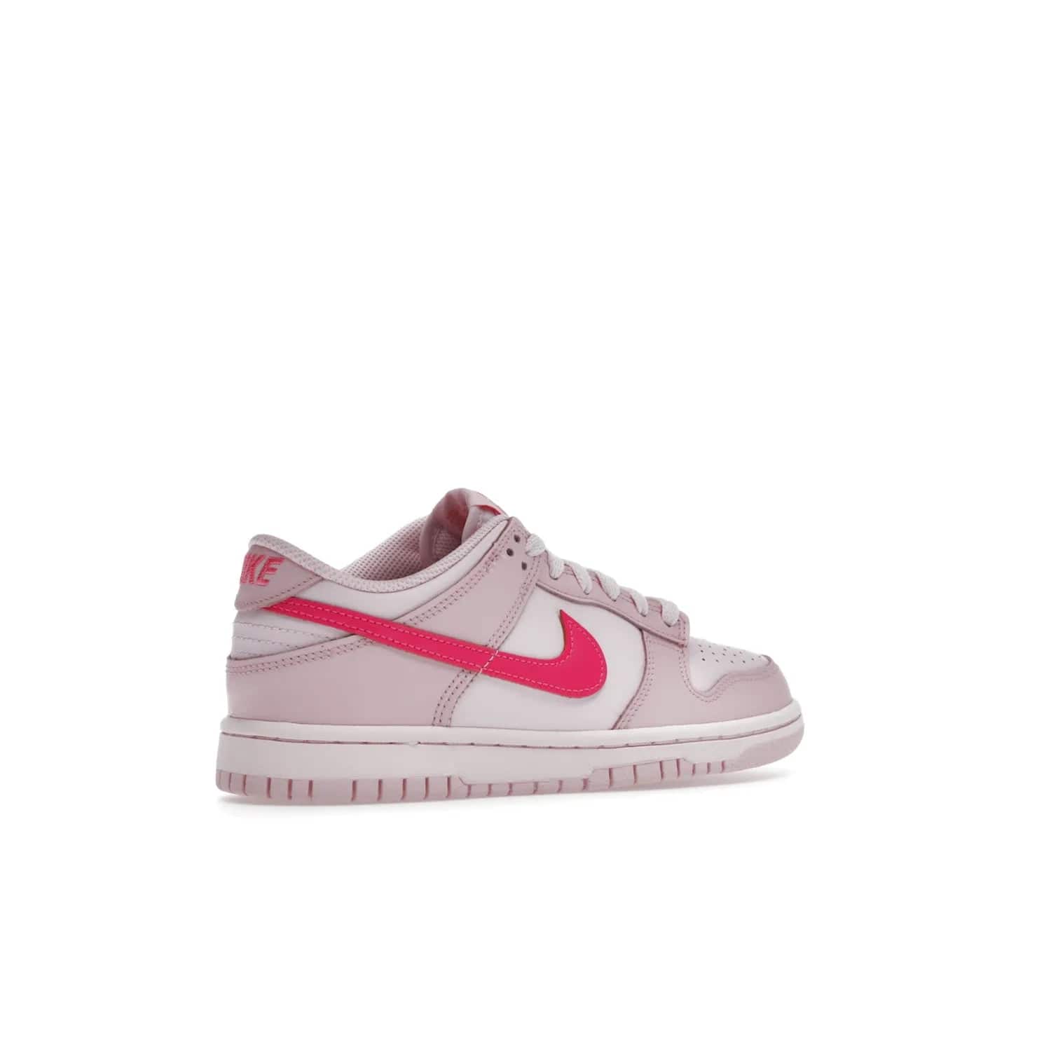 Nike Dunk Low Triple Pink (GS) - Image 34 - Only at www.BallersClubKickz.com - The Nike Dunk Low Triple Pink provides bold style in GS sizing. Featuring 3 distinct shades of pink and Nike branding, the shoe stands out.