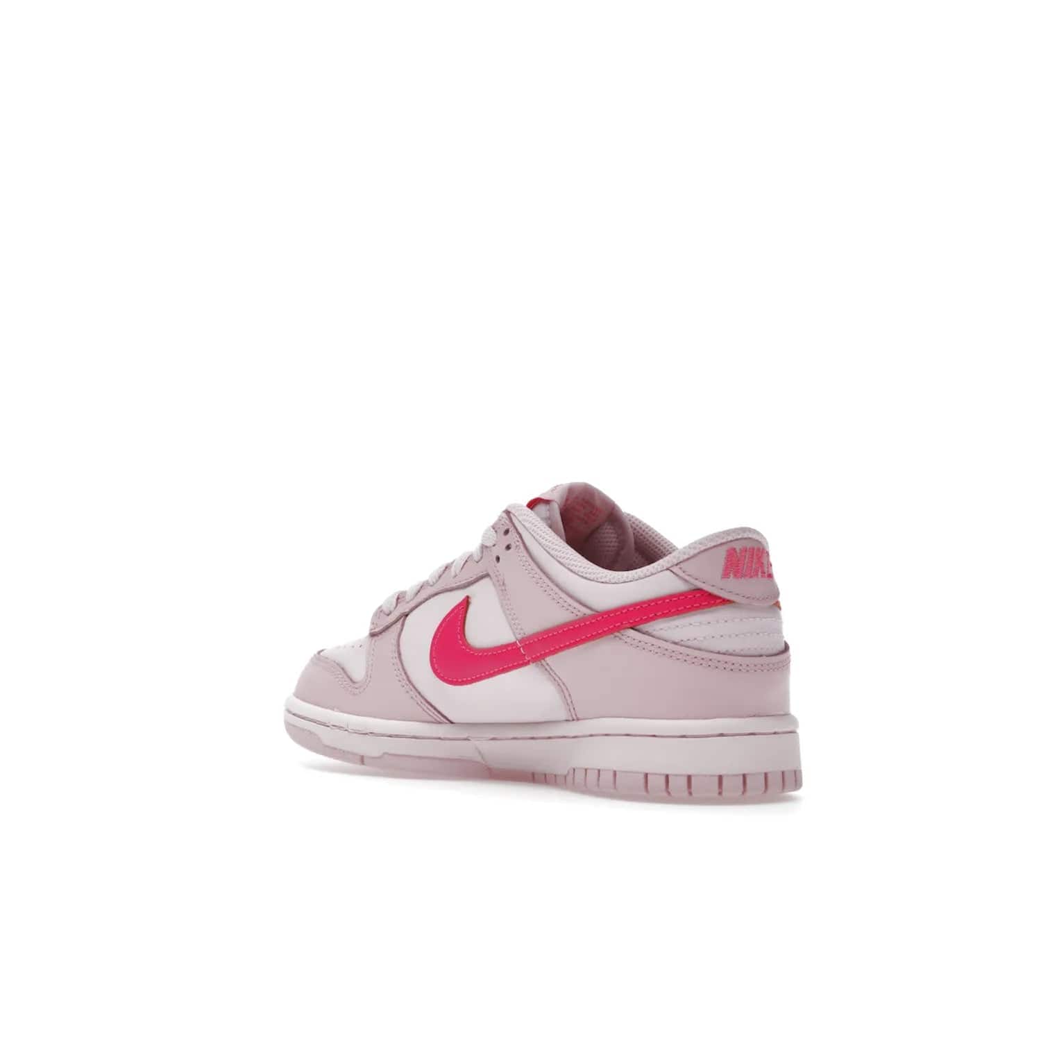 Nike Dunk Low Triple Pink (GS) - Image 24 - Only at www.BallersClubKickz.com - The Nike Dunk Low Triple Pink provides bold style in GS sizing. Featuring 3 distinct shades of pink and Nike branding, the shoe stands out.