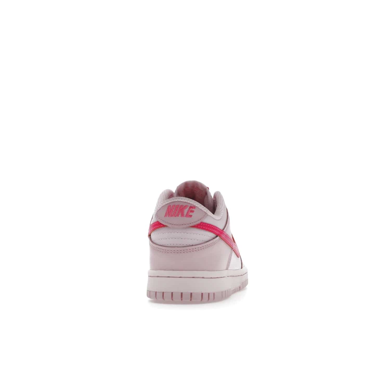 Nike Dunk Low Triple Pink (GS) - Image 29 - Only at www.BallersClubKickz.com - The Nike Dunk Low Triple Pink provides bold style in GS sizing. Featuring 3 distinct shades of pink and Nike branding, the shoe stands out.