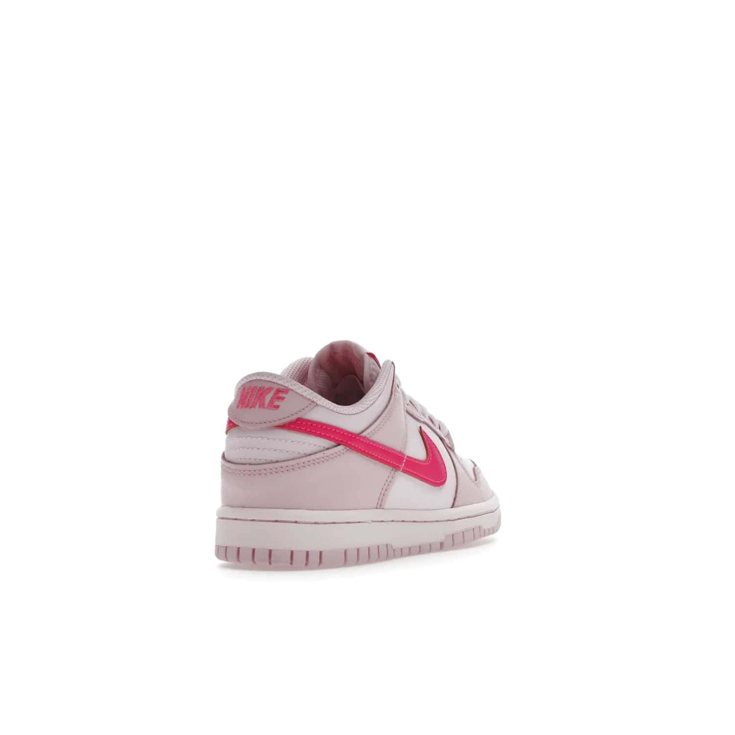Nike Dunk Low Triple Pink (GS) - Image 31 - Only at www.BallersClubKickz.com - The Nike Dunk Low Triple Pink provides bold style in GS sizing. Featuring 3 distinct shades of pink and Nike branding, the shoe stands out.
