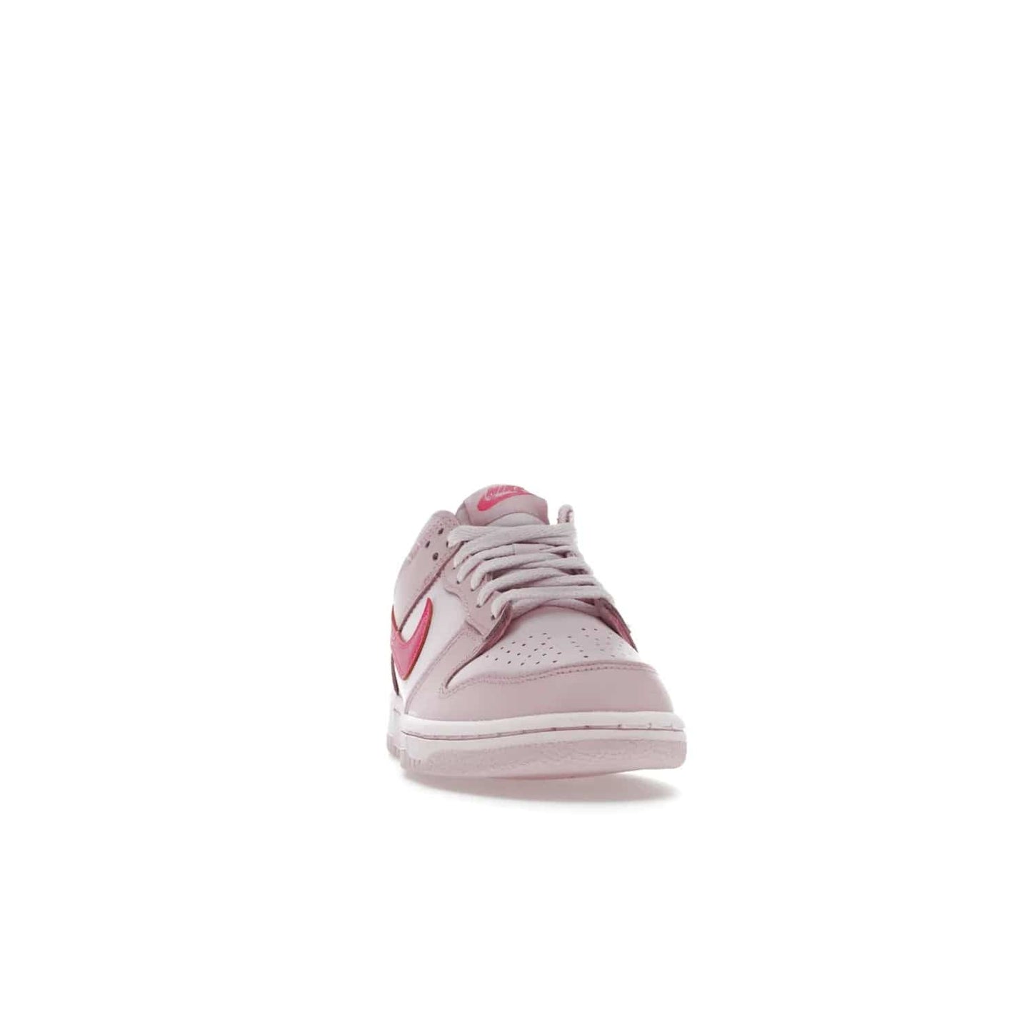 Nike Dunk Low Triple Pink (GS) - Image 9 - Only at www.BallersClubKickz.com - The Nike Dunk Low Triple Pink provides bold style in GS sizing. Featuring 3 distinct shades of pink and Nike branding, the shoe stands out.