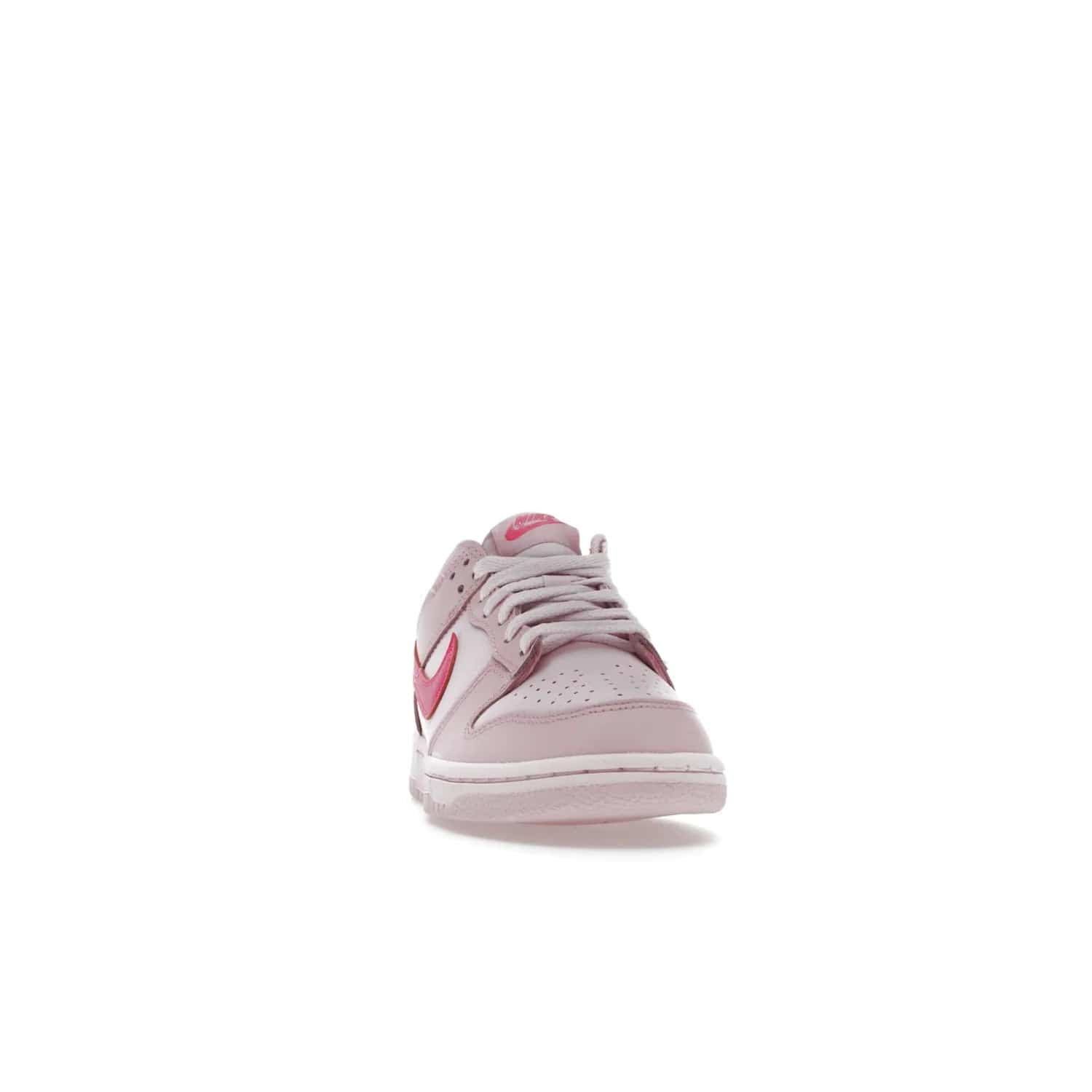 Nike Dunk Low Triple Pink (GS) - Image 9 - Only at www.BallersClubKickz.com - The Nike Dunk Low Triple Pink provides bold style in GS sizing. Featuring 3 distinct shades of pink and Nike branding, the shoe stands out.