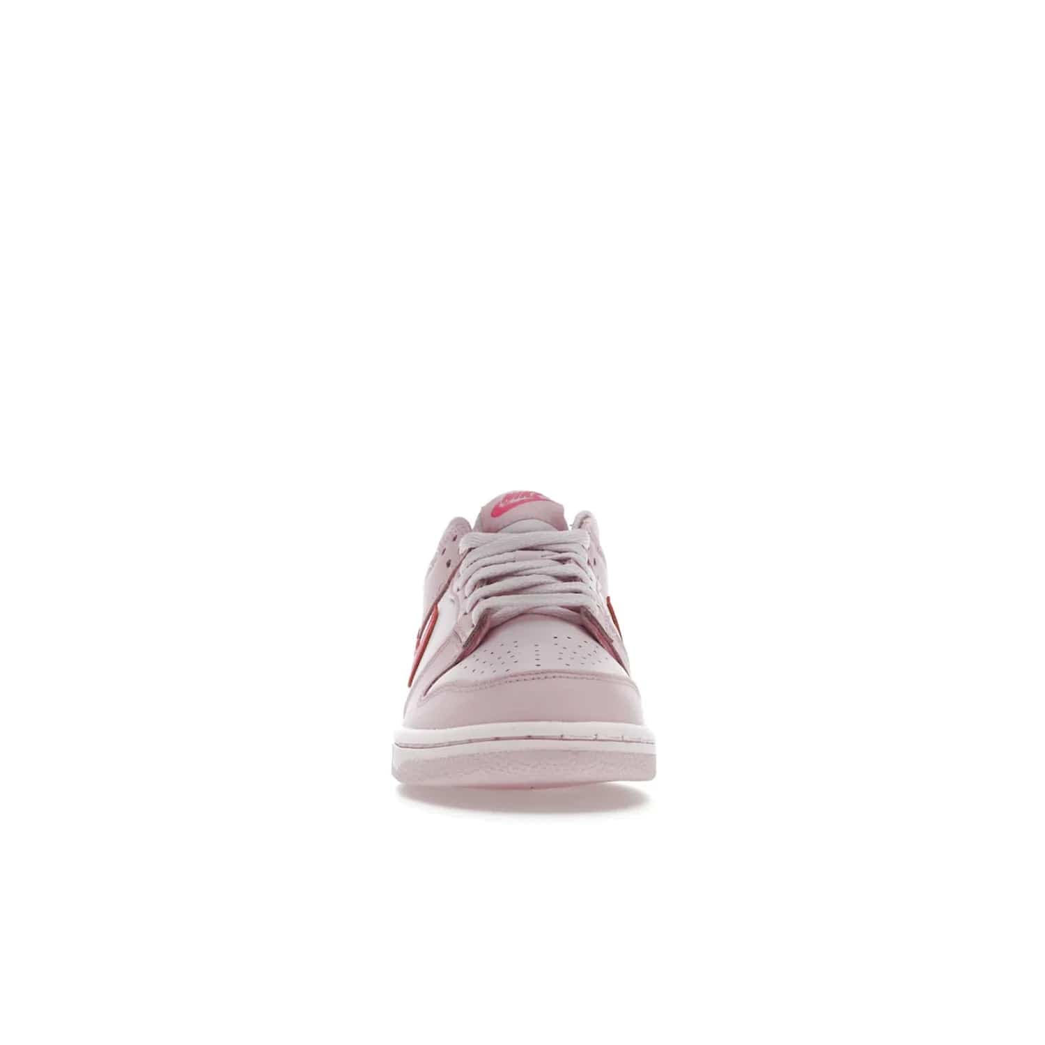 Nike Dunk Low Triple Pink (GS) - Image 10 - Only at www.BallersClubKickz.com - The Nike Dunk Low Triple Pink provides bold style in GS sizing. Featuring 3 distinct shades of pink and Nike branding, the shoe stands out.
