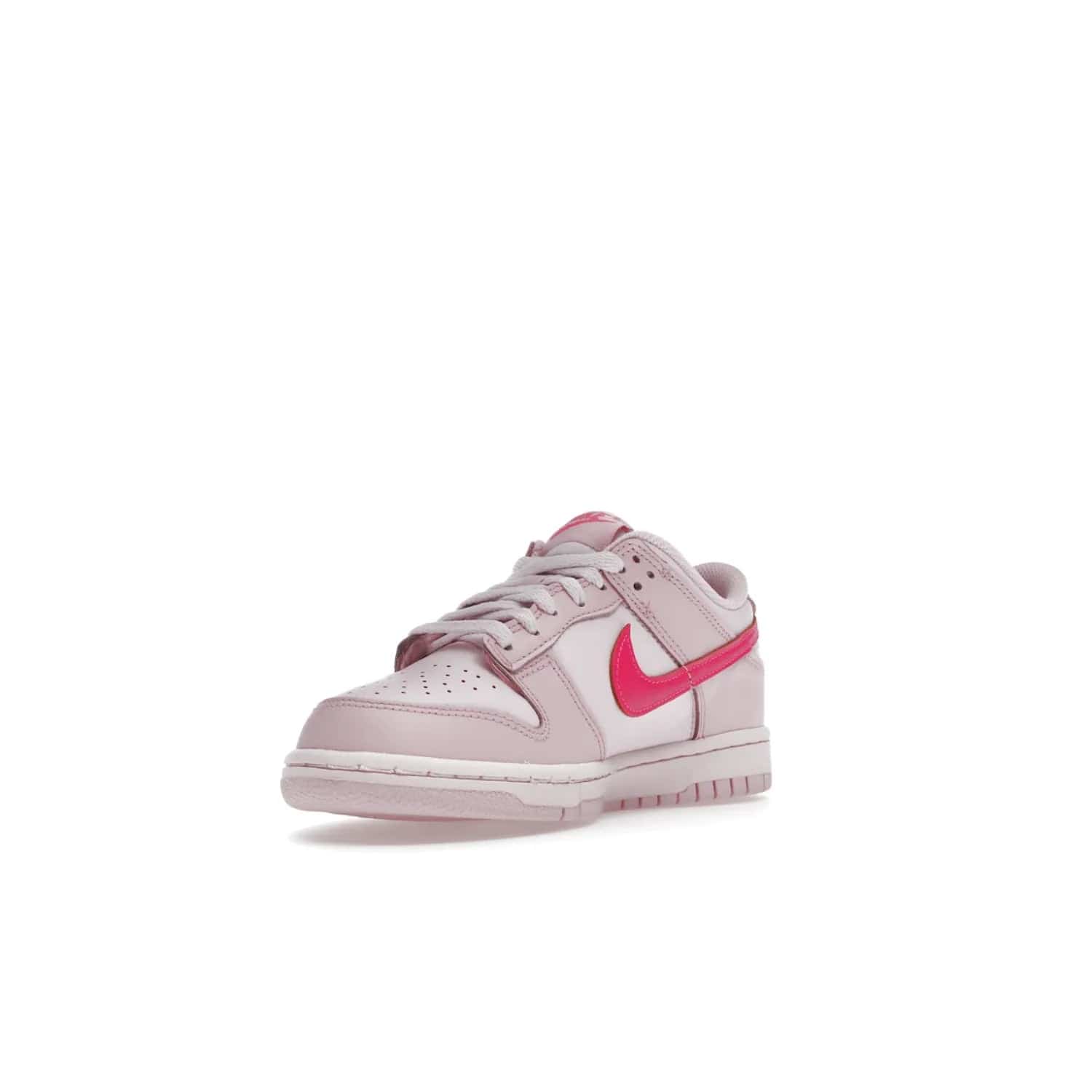 Nike Dunk Low Triple Pink (GS) - Image 14 - Only at www.BallersClubKickz.com - The Nike Dunk Low Triple Pink provides bold style in GS sizing. Featuring 3 distinct shades of pink and Nike branding, the shoe stands out.