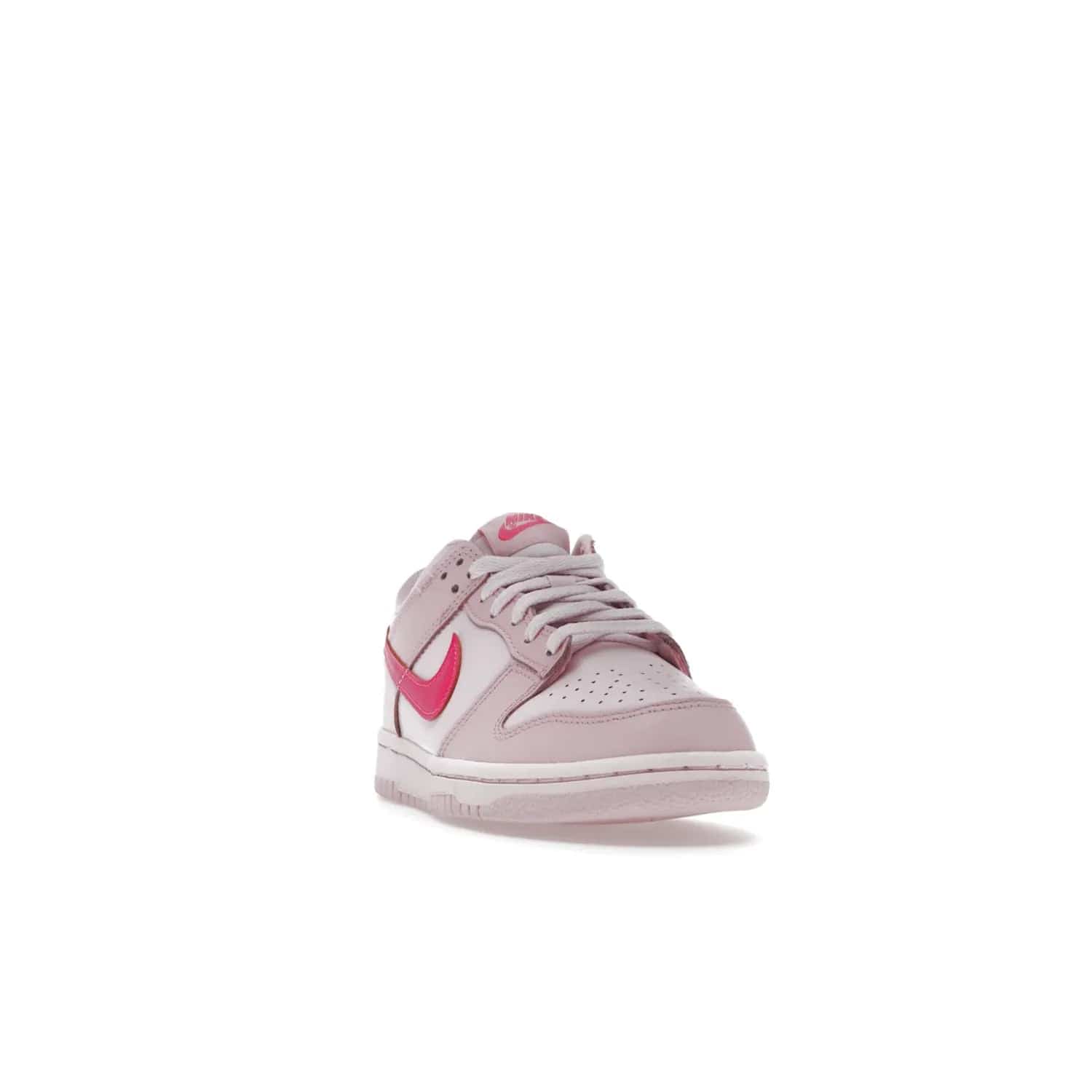 Nike Dunk Low Triple Pink (GS) - Image 8 - Only at www.BallersClubKickz.com - The Nike Dunk Low Triple Pink provides bold style in GS sizing. Featuring 3 distinct shades of pink and Nike branding, the shoe stands out.