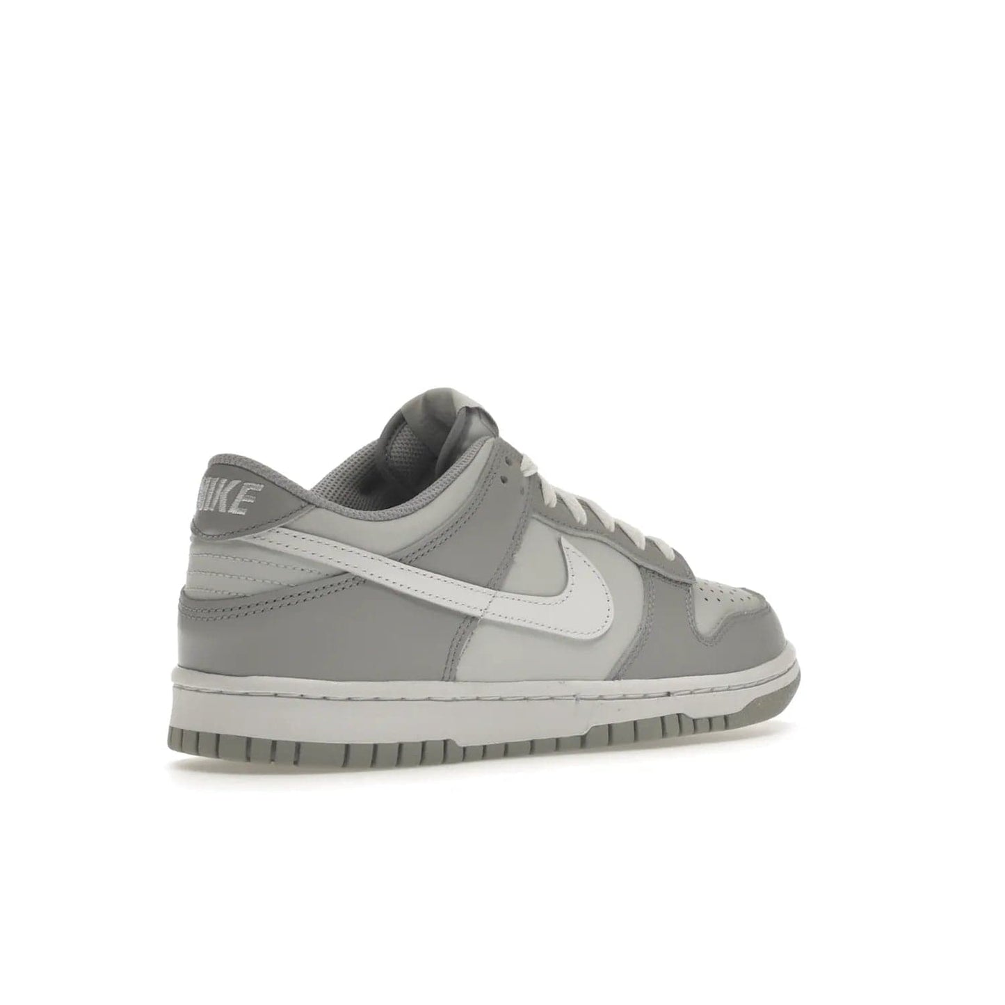 Nike Dunk Low Two-Toned Grey (GS) - Image 33 - Only at www.BallersClubKickz.com - Stylish Nike Dunk Low GS Two-Toned Grey featuring leather build, light/dark grey shades, white Swoosh logo & gray rubber outsole. Get ready to make a statement with this timeless classic released in March 2022.