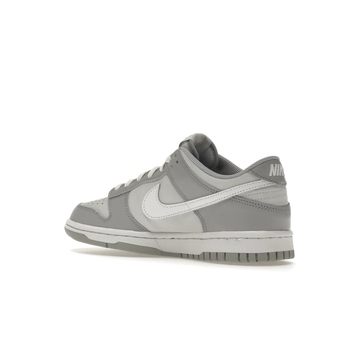 Nike Dunk Low Two-Toned Grey (GS) - Image 23 - Only at www.BallersClubKickz.com - Stylish Nike Dunk Low GS Two-Toned Grey featuring leather build, light/dark grey shades, white Swoosh logo & gray rubber outsole. Get ready to make a statement with this timeless classic released in March 2022.
