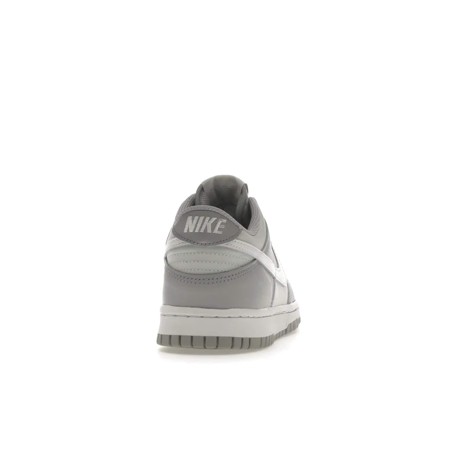 Nike Dunk Low Two-Toned Grey (GS) - Image 29 - Only at www.BallersClubKickz.com - Stylish Nike Dunk Low GS Two-Toned Grey featuring leather build, light/dark grey shades, white Swoosh logo & gray rubber outsole. Get ready to make a statement with this timeless classic released in March 2022.