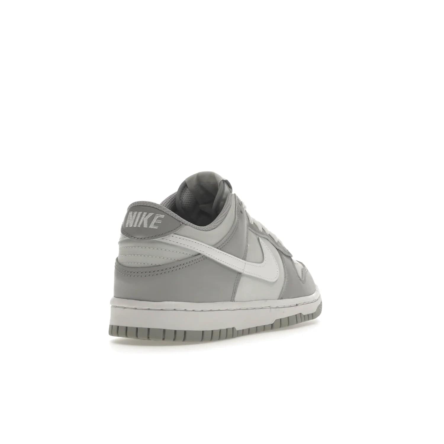 Nike Dunk Low Two-Toned Grey (GS) - Image 31 - Only at www.BallersClubKickz.com - Stylish Nike Dunk Low GS Two-Toned Grey featuring leather build, light/dark grey shades, white Swoosh logo & gray rubber outsole. Get ready to make a statement with this timeless classic released in March 2022.