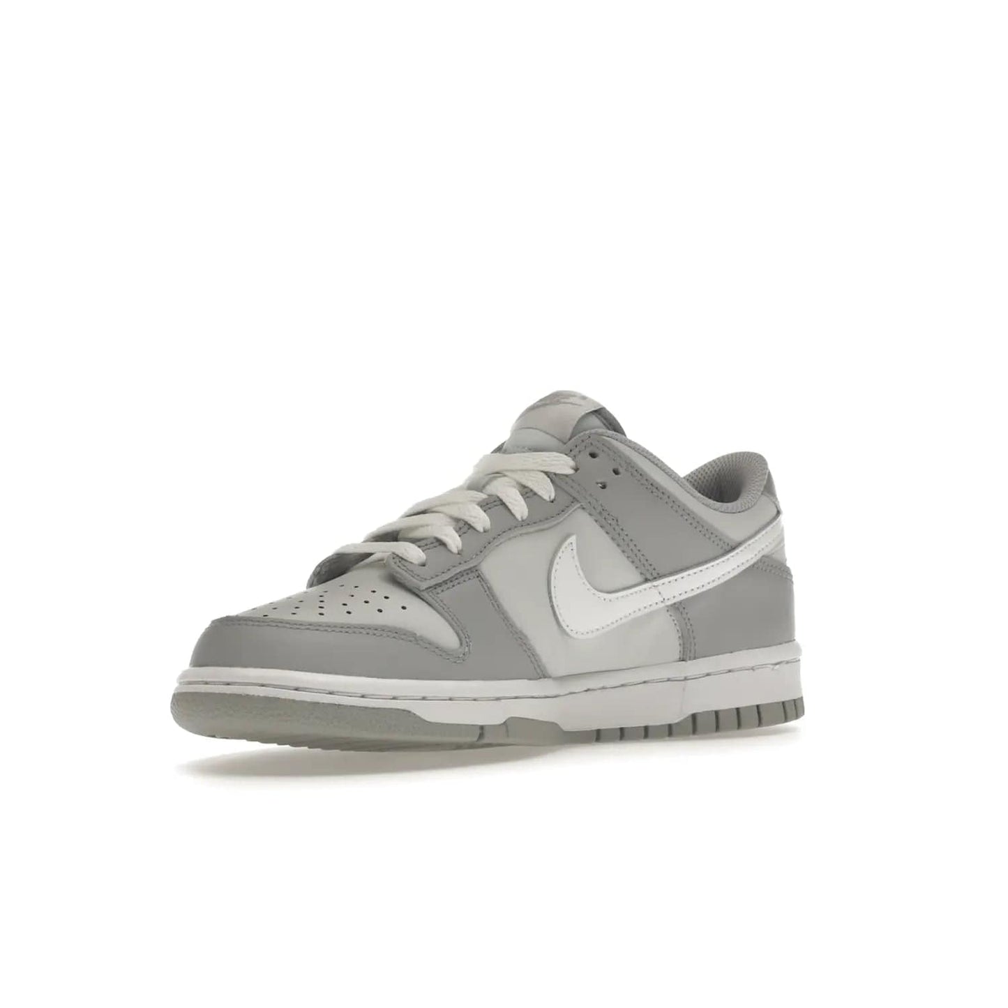 Nike Dunk Low Two-Toned Grey (GS) - Image 15 - Only at www.BallersClubKickz.com - Stylish Nike Dunk Low GS Two-Toned Grey featuring leather build, light/dark grey shades, white Swoosh logo & gray rubber outsole. Get ready to make a statement with this timeless classic released in March 2022.