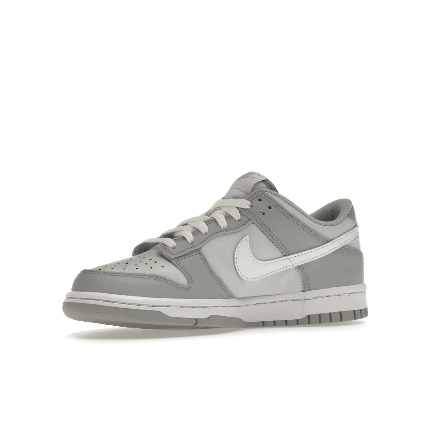 Nike Dunk Low Two-Toned Grey (GS) - Image 16 - Only at www.BallersClubKickz.com - Stylish Nike Dunk Low GS Two-Toned Grey featuring leather build, light/dark grey shades, white Swoosh logo & gray rubber outsole. Get ready to make a statement with this timeless classic released in March 2022.