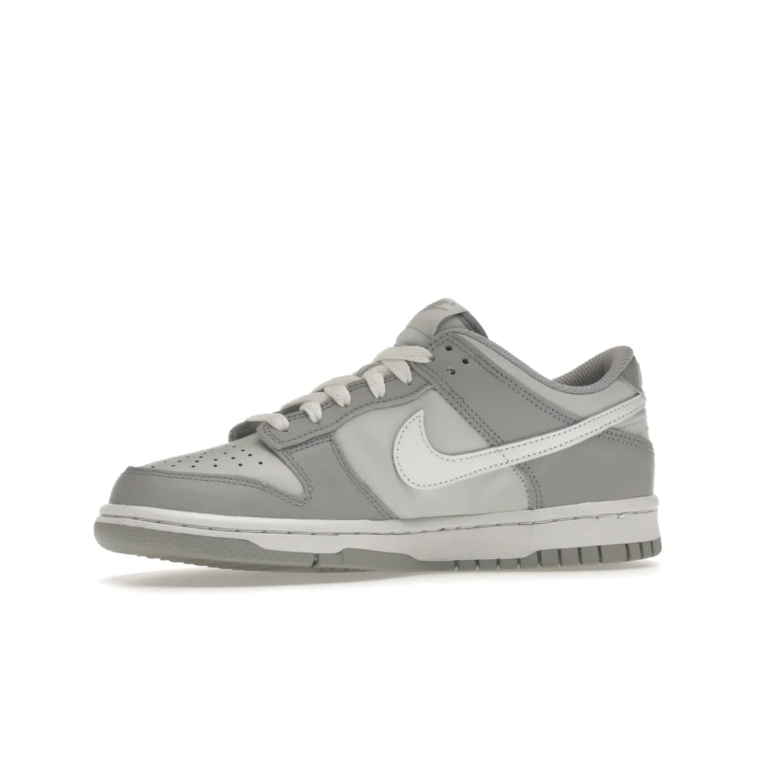 Nike Dunk Low Two-Toned Grey (GS) - Image 17 - Only at www.BallersClubKickz.com - Stylish Nike Dunk Low GS Two-Toned Grey featuring leather build, light/dark grey shades, white Swoosh logo & gray rubber outsole. Get ready to make a statement with this timeless classic released in March 2022.