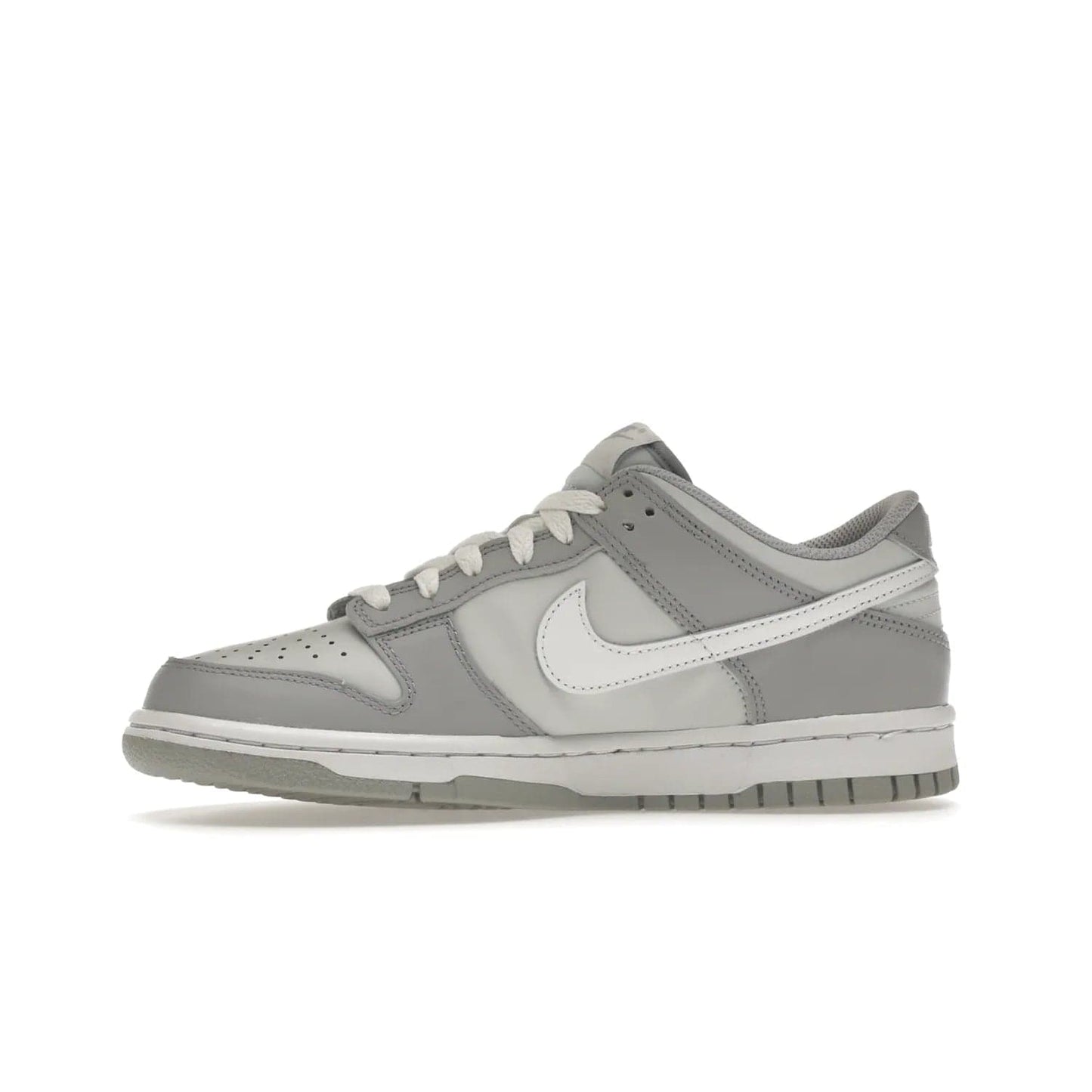 Nike Dunk Low Two-Toned Grey (GS) - Image 18 - Only at www.BallersClubKickz.com - Stylish Nike Dunk Low GS Two-Toned Grey featuring leather build, light/dark grey shades, white Swoosh logo & gray rubber outsole. Get ready to make a statement with this timeless classic released in March 2022.