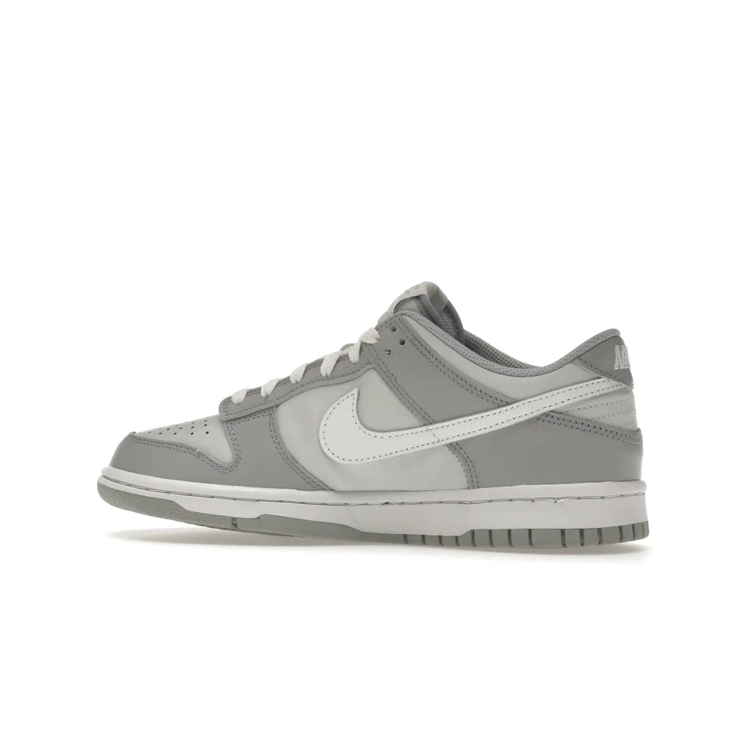Nike Dunk Low Two-Toned Grey (GS) - Image 21 - Only at www.BallersClubKickz.com - Stylish Nike Dunk Low GS Two-Toned Grey featuring leather build, light/dark grey shades, white Swoosh logo & gray rubber outsole. Get ready to make a statement with this timeless classic released in March 2022.
