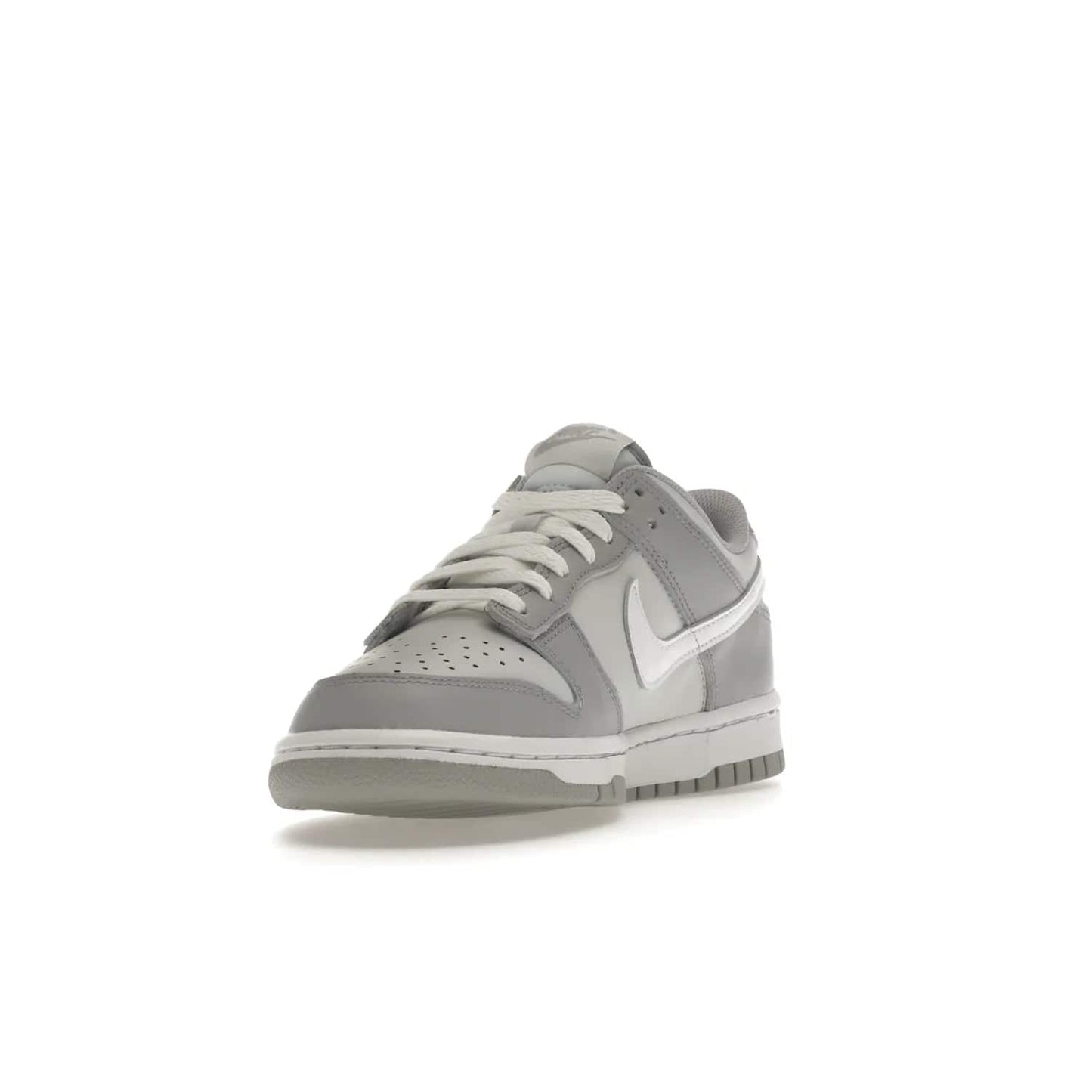 Nike Dunk Low Two-Toned Grey (GS) - Image 13 - Only at www.BallersClubKickz.com - Stylish Nike Dunk Low GS Two-Toned Grey featuring leather build, light/dark grey shades, white Swoosh logo & gray rubber outsole. Get ready to make a statement with this timeless classic released in March 2022.